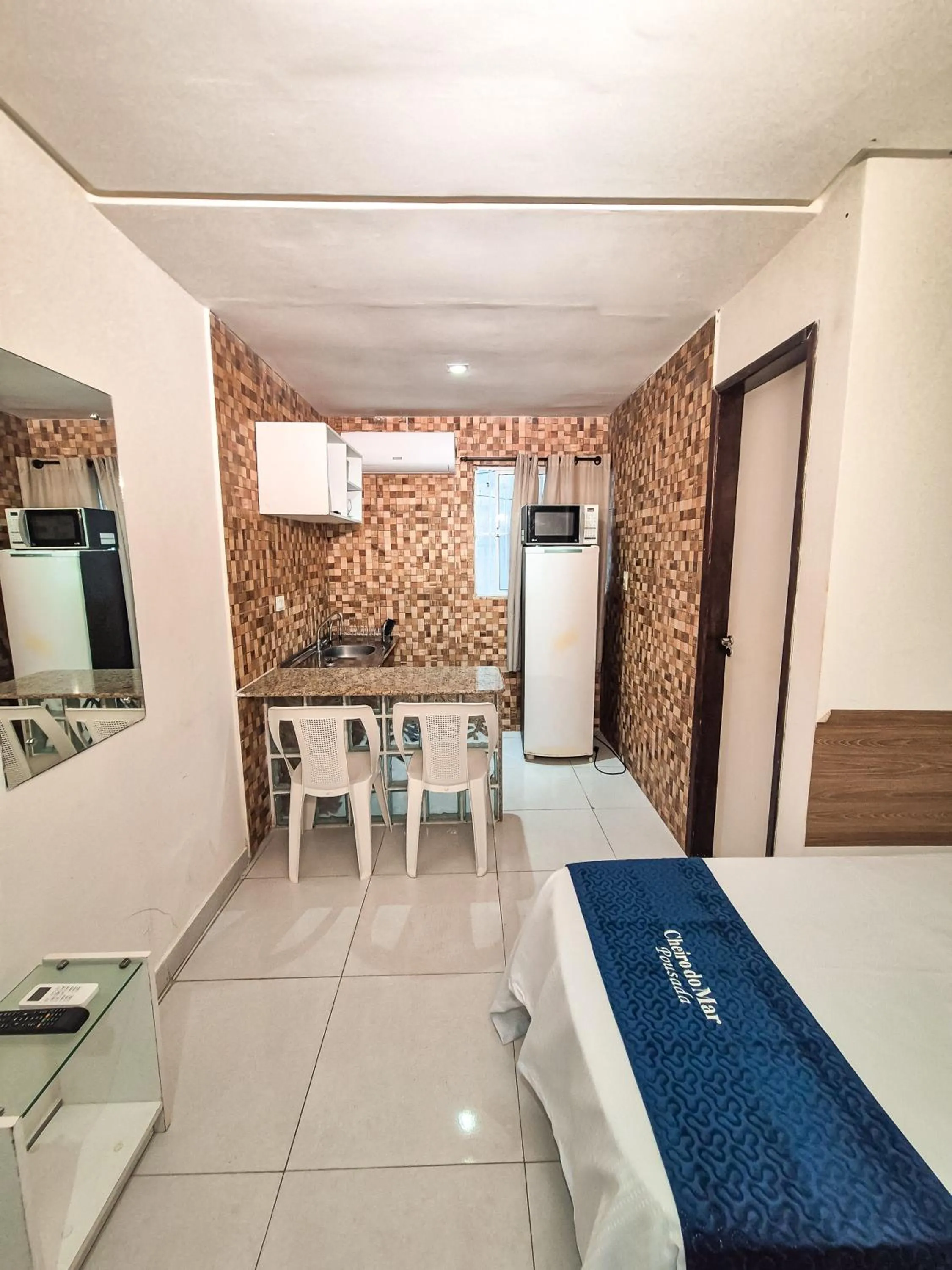 Kitchen or kitchenette in Pousada Cheiro do Mar