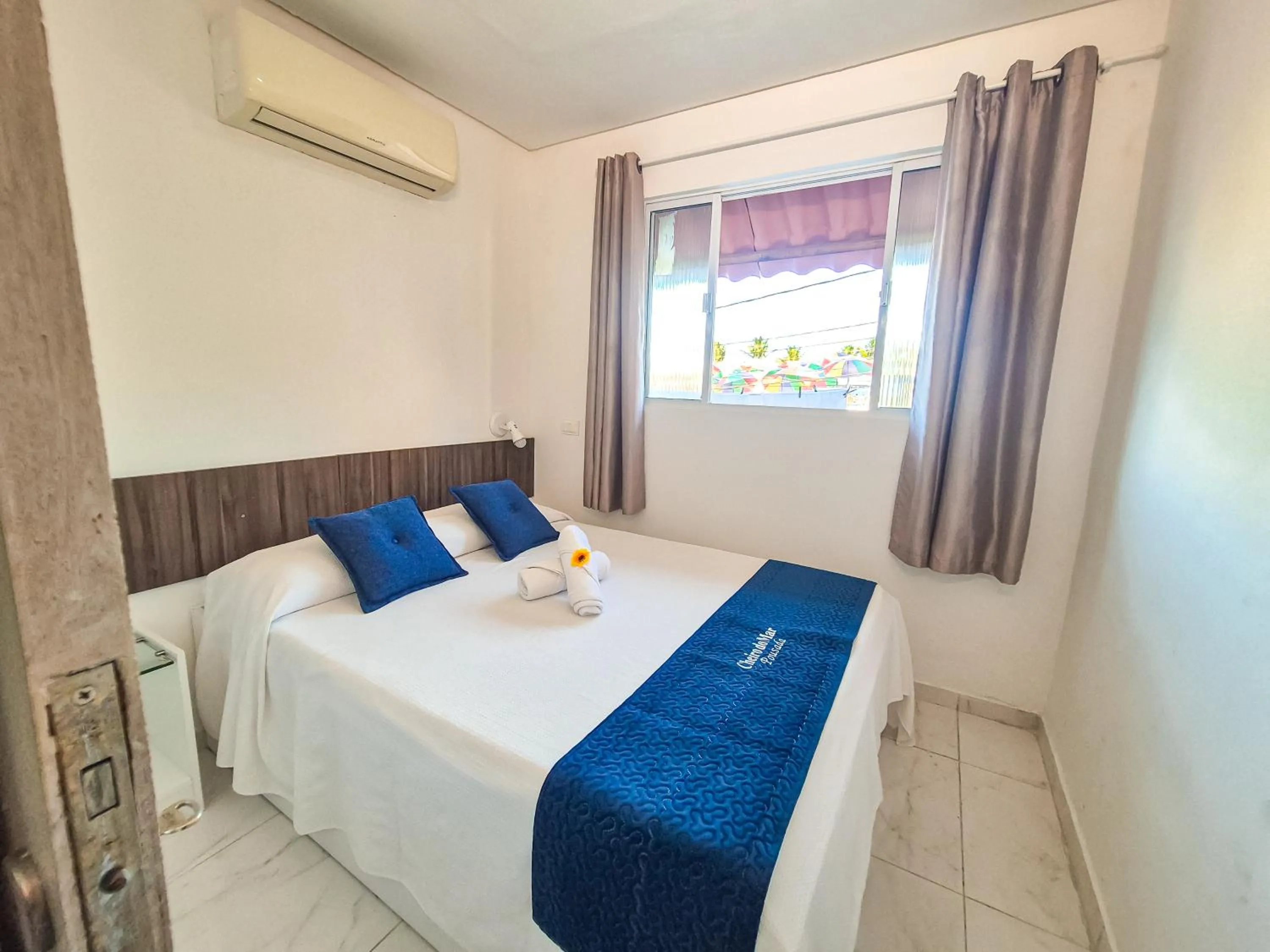 Bed in Pousada Cheiro do Mar