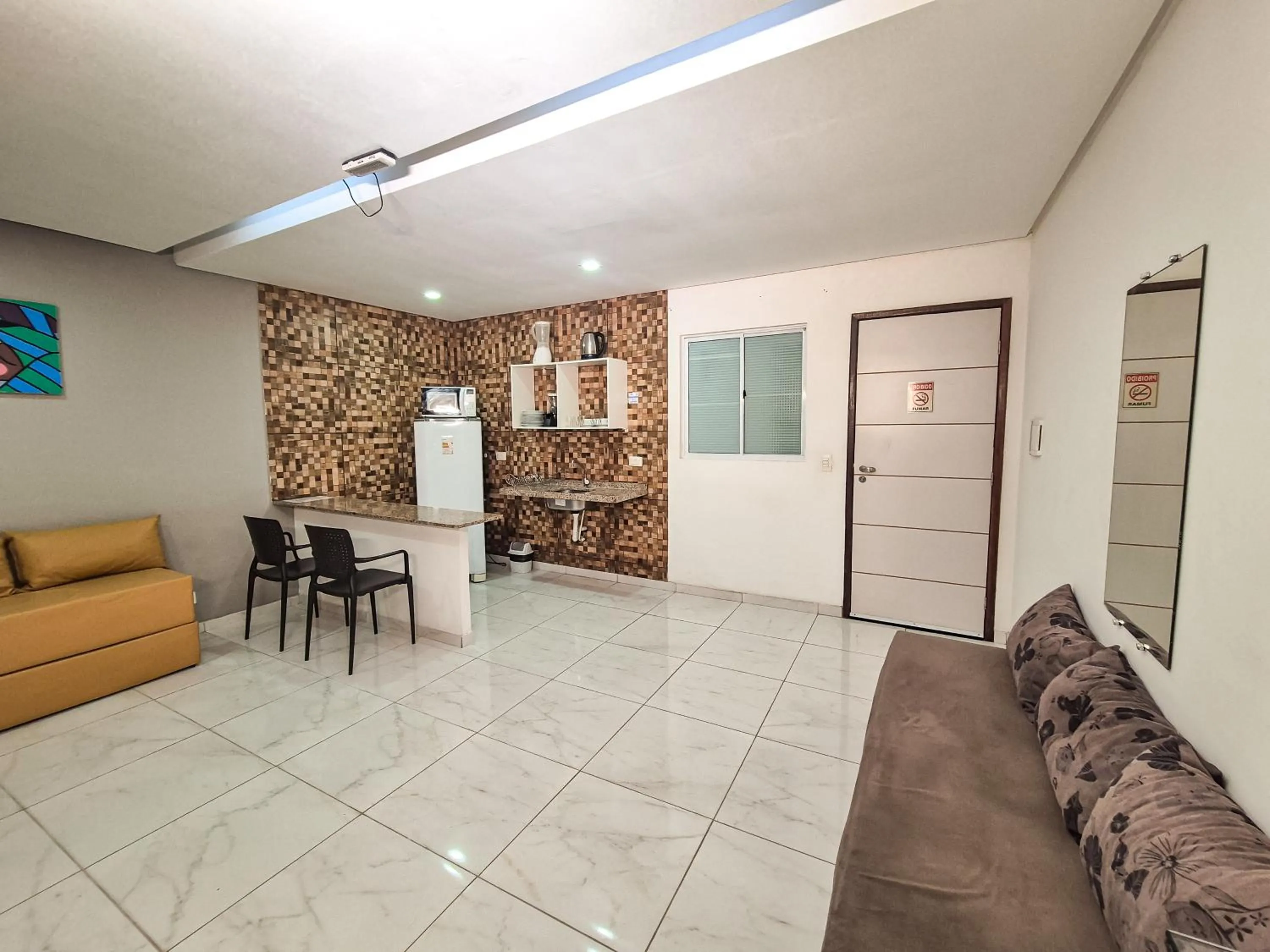 Kitchen or kitchenette in Pousada Cheiro do Mar