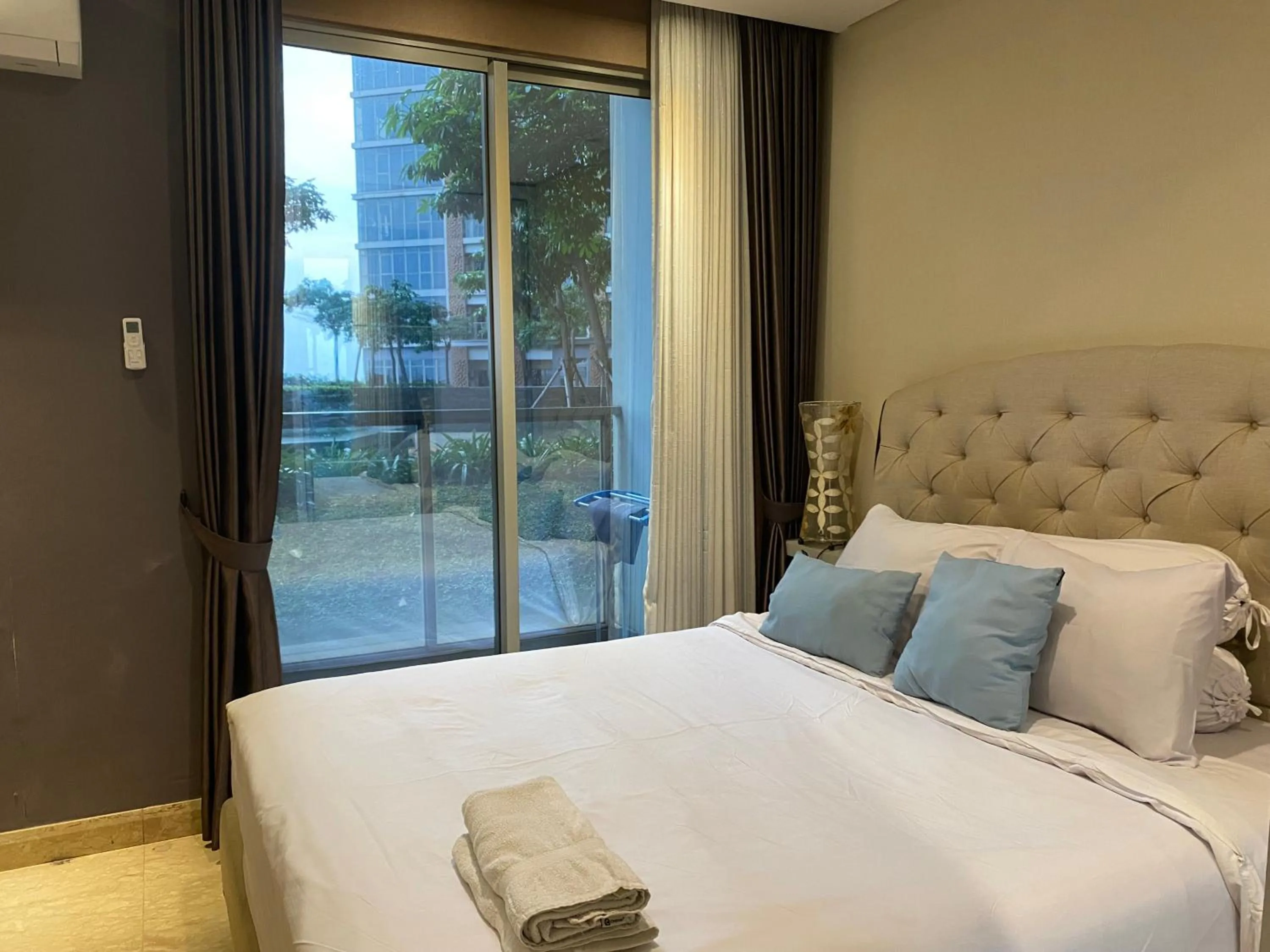 Bedroom, Bed in Comfort and Luxury Private Room at Goldcoast PIK