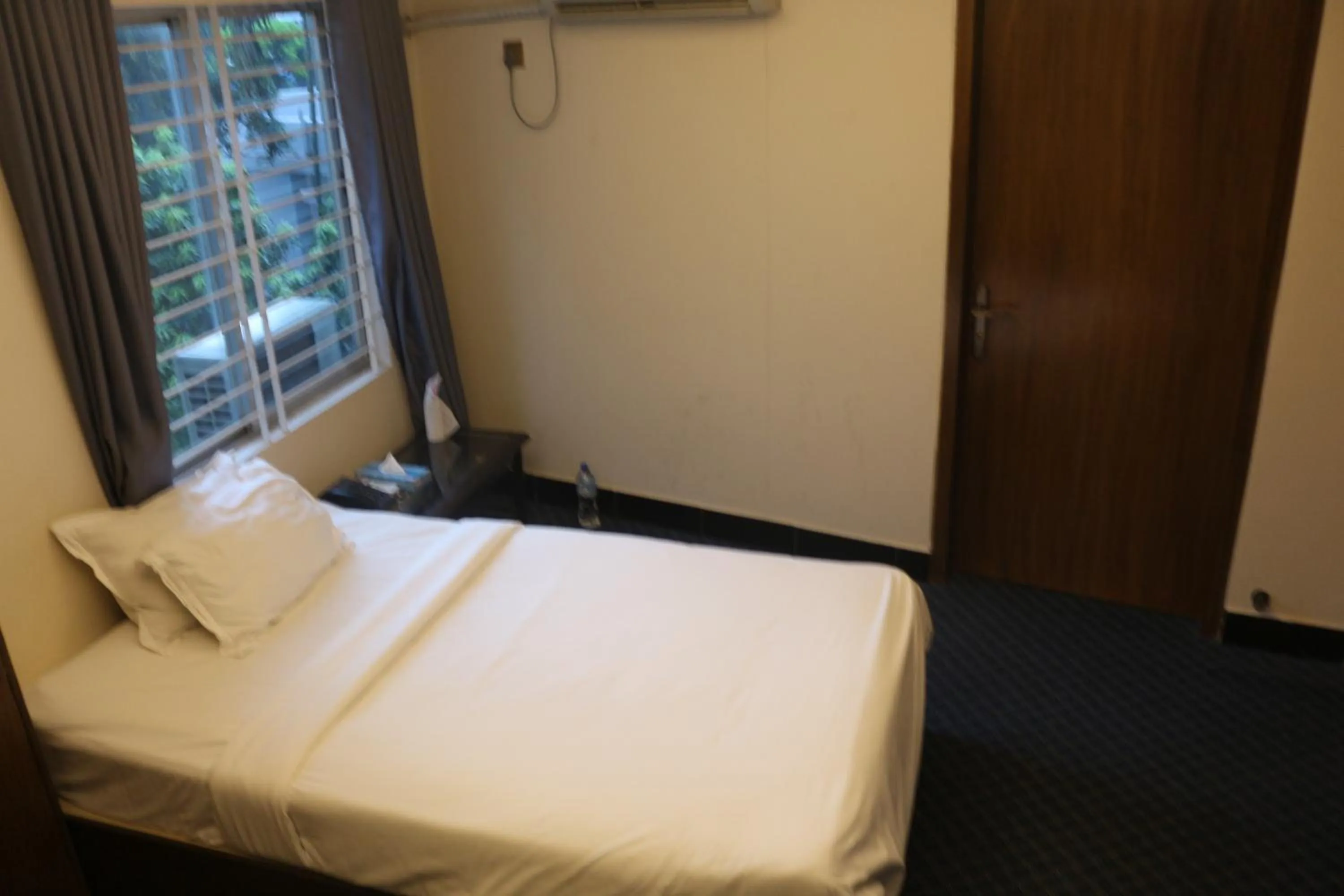 Bed in New Hotel Grand View