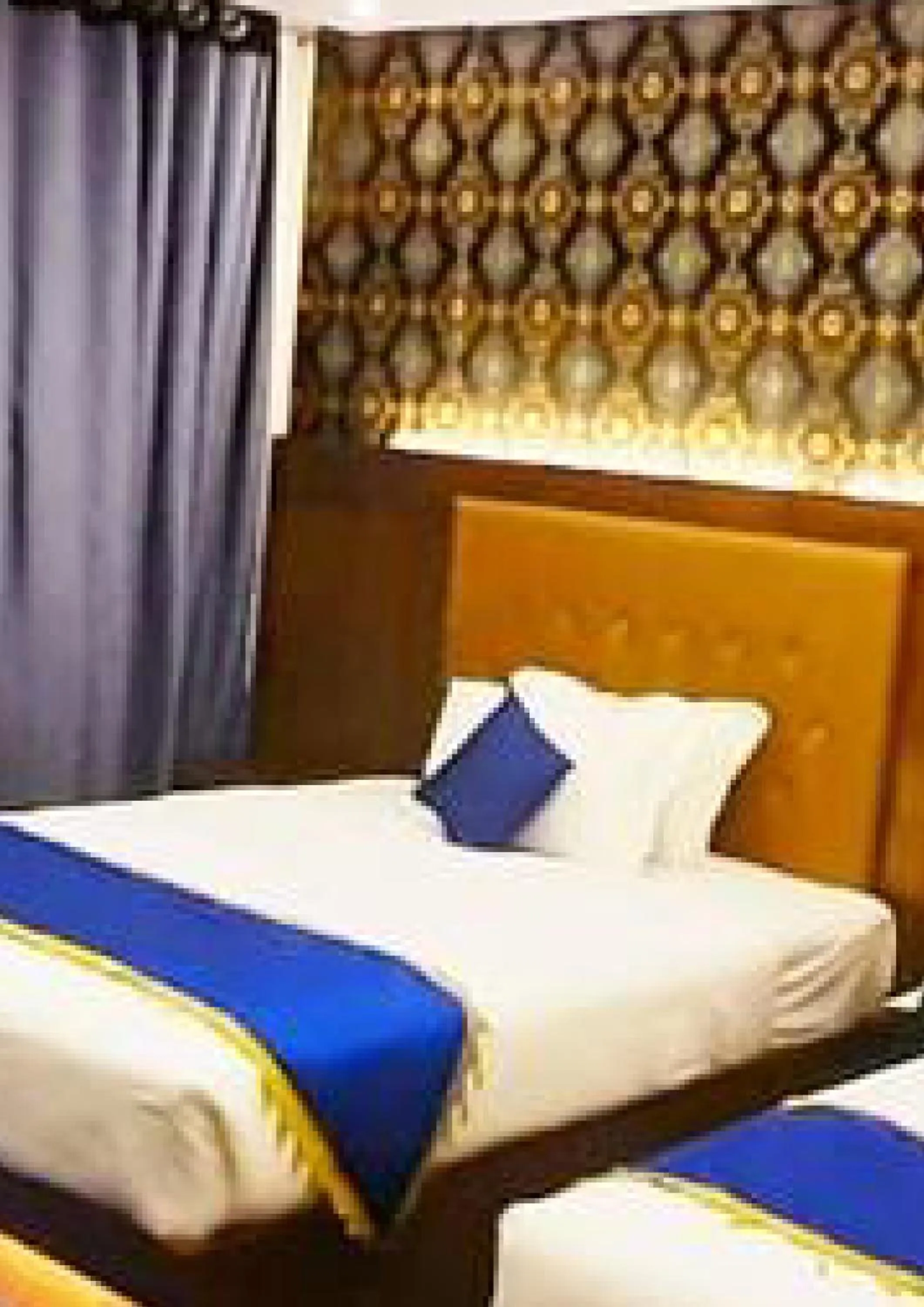 Bed in New Hotel Grand View