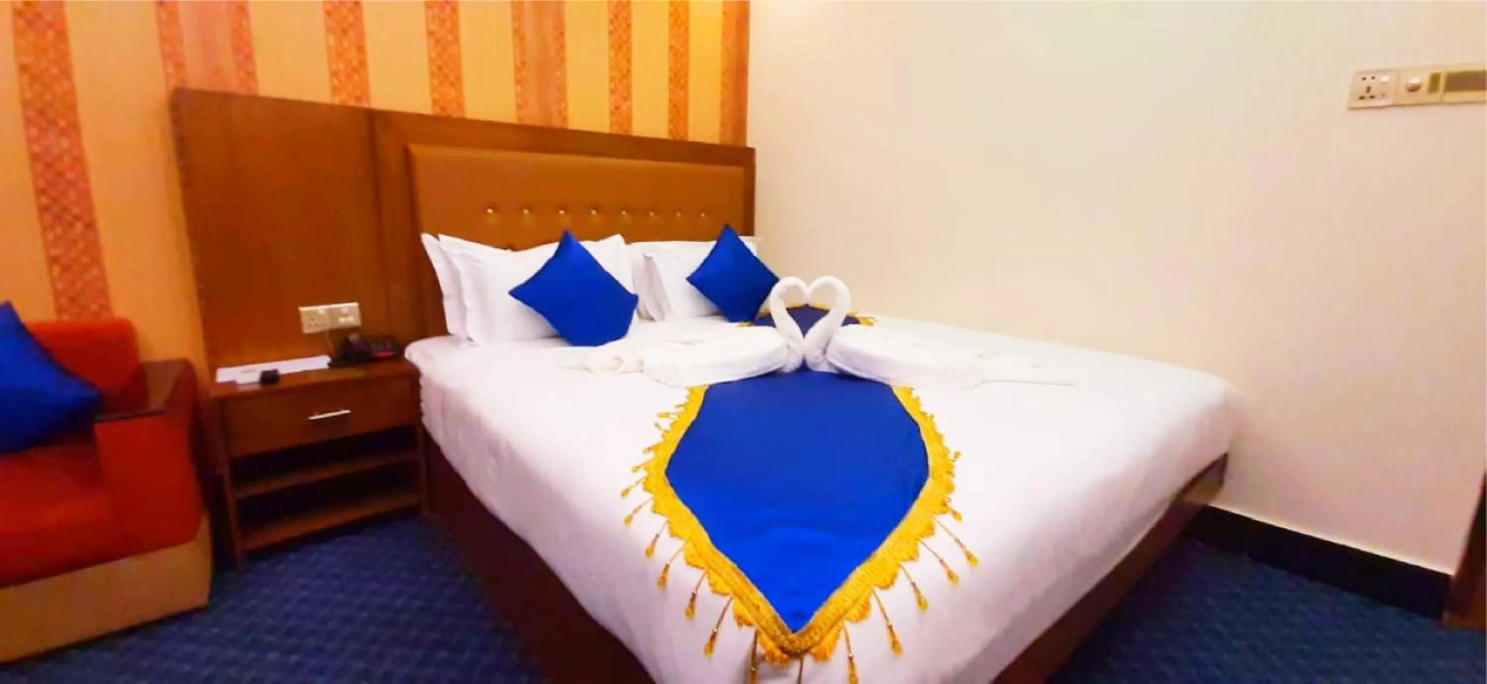 Bed in New Hotel Grand View