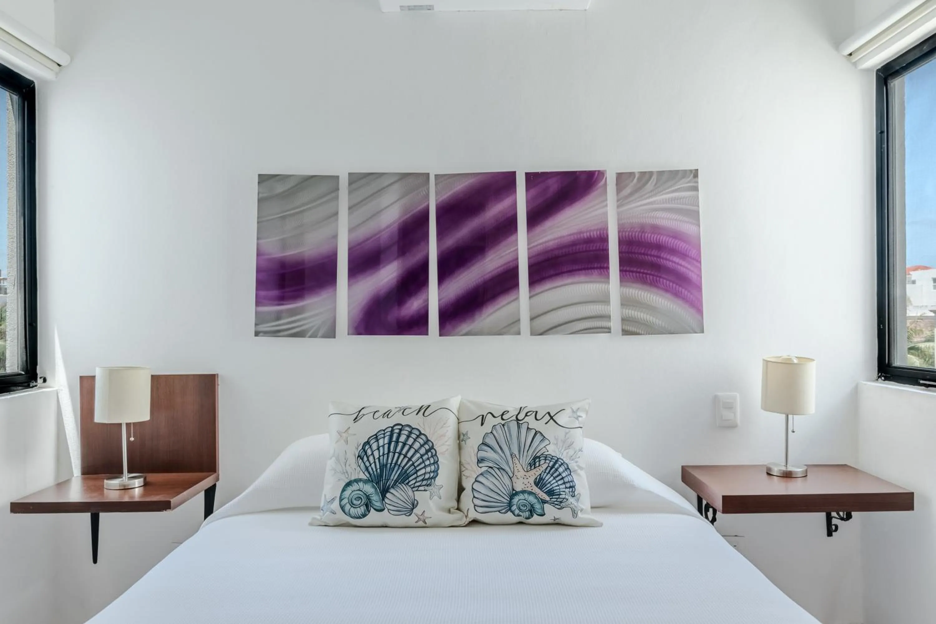 Bed in Vela's Condos Ocean Front