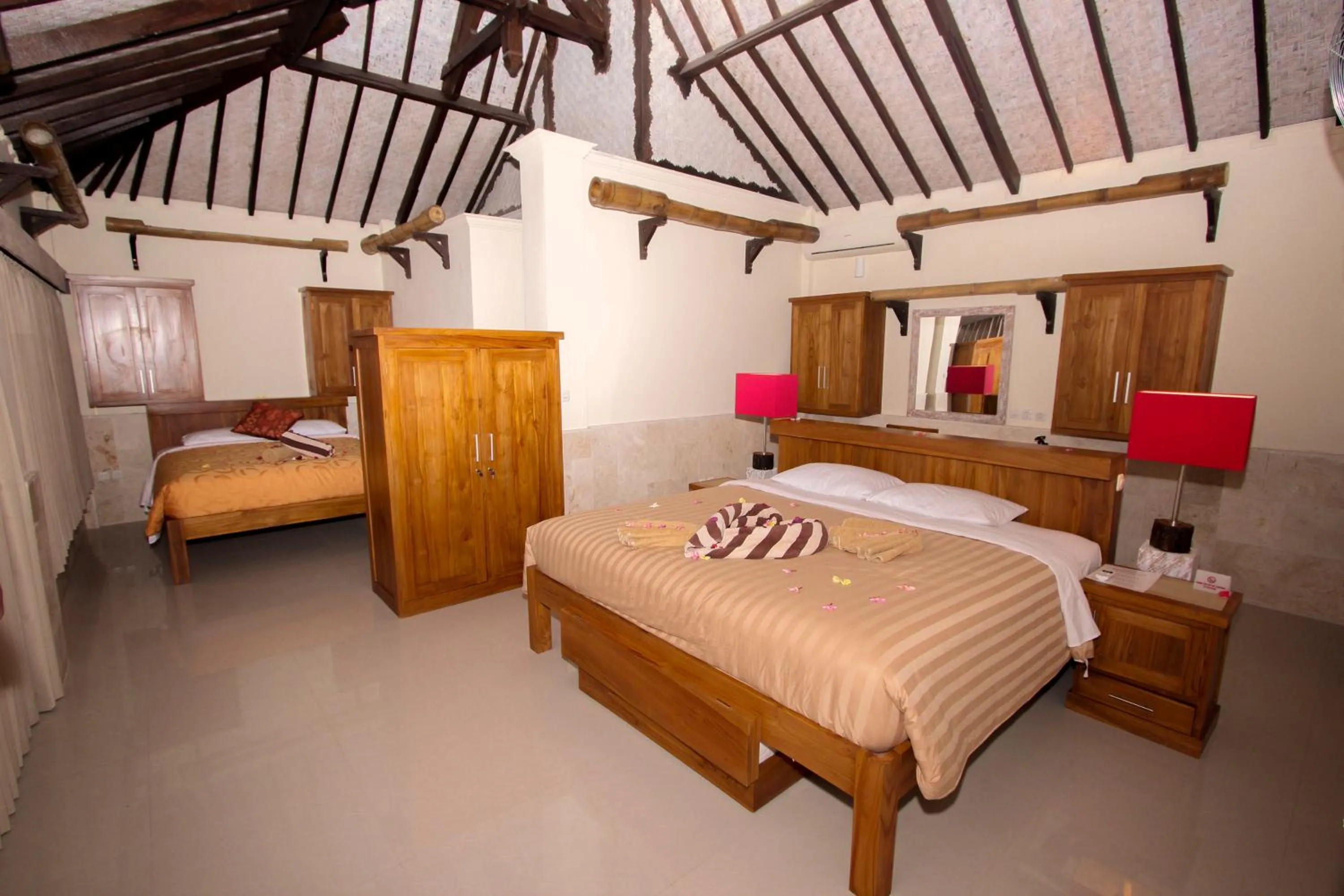Photo of the whole room, Bed in Rinjani Lodge