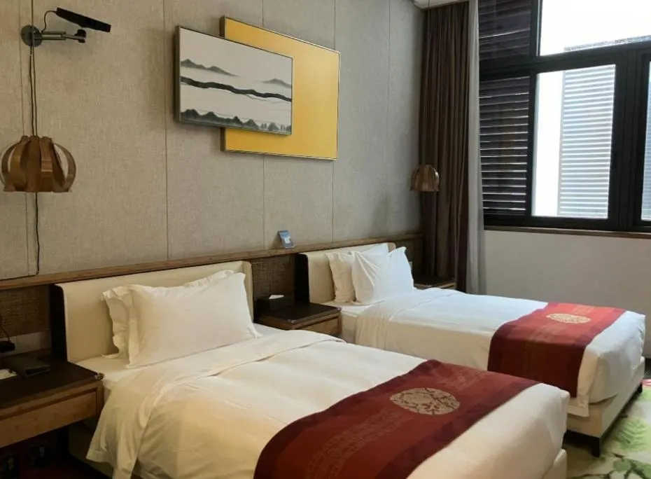 Bed in Nanxianglou Art Hotel