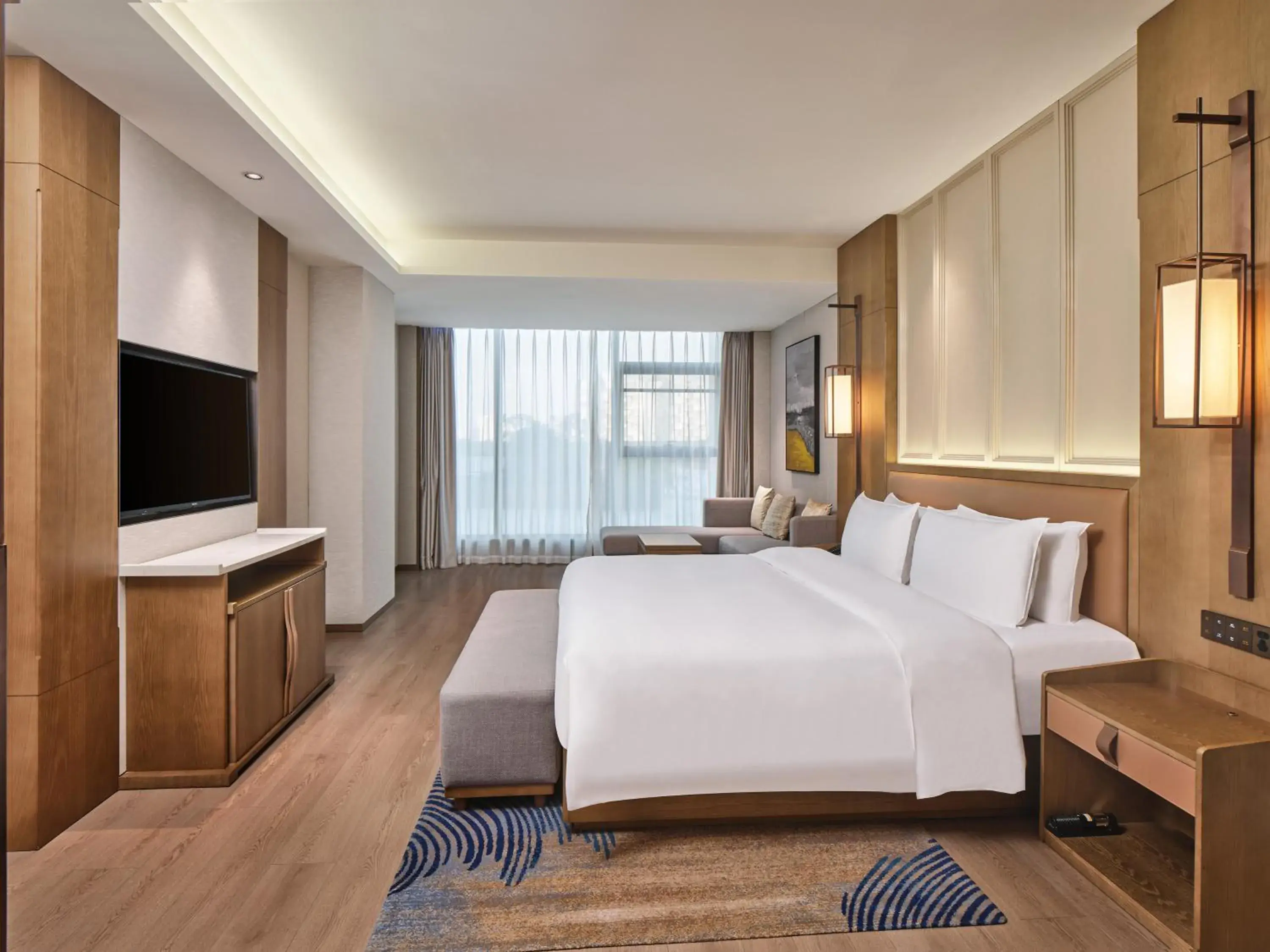 Bed in Crowne Plaza Chengdu Wuhou by IHG Bed in Crowne Plaza Chengdu Wuhou by IHG