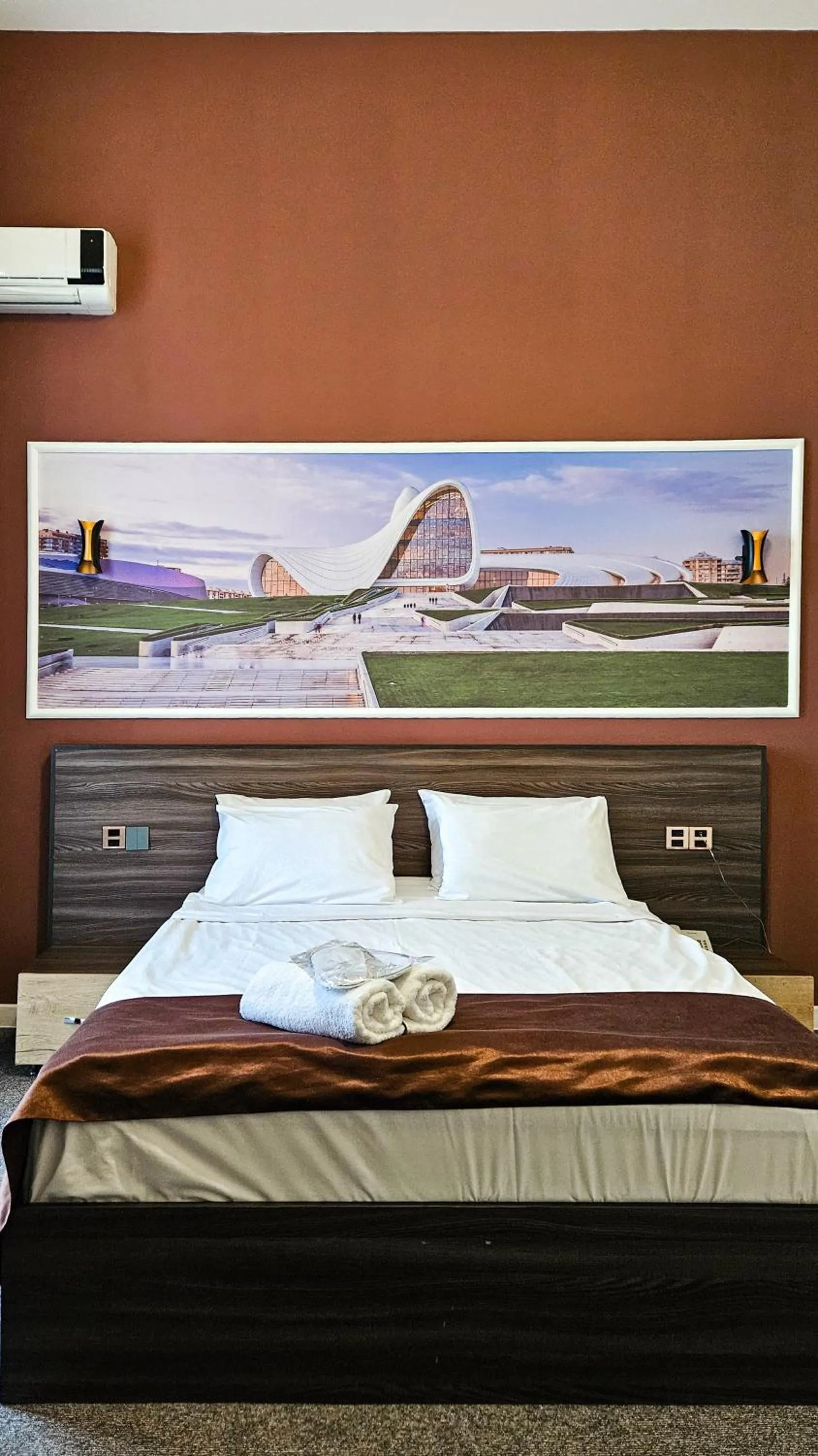 Bed in ELYSIUM HOTEL