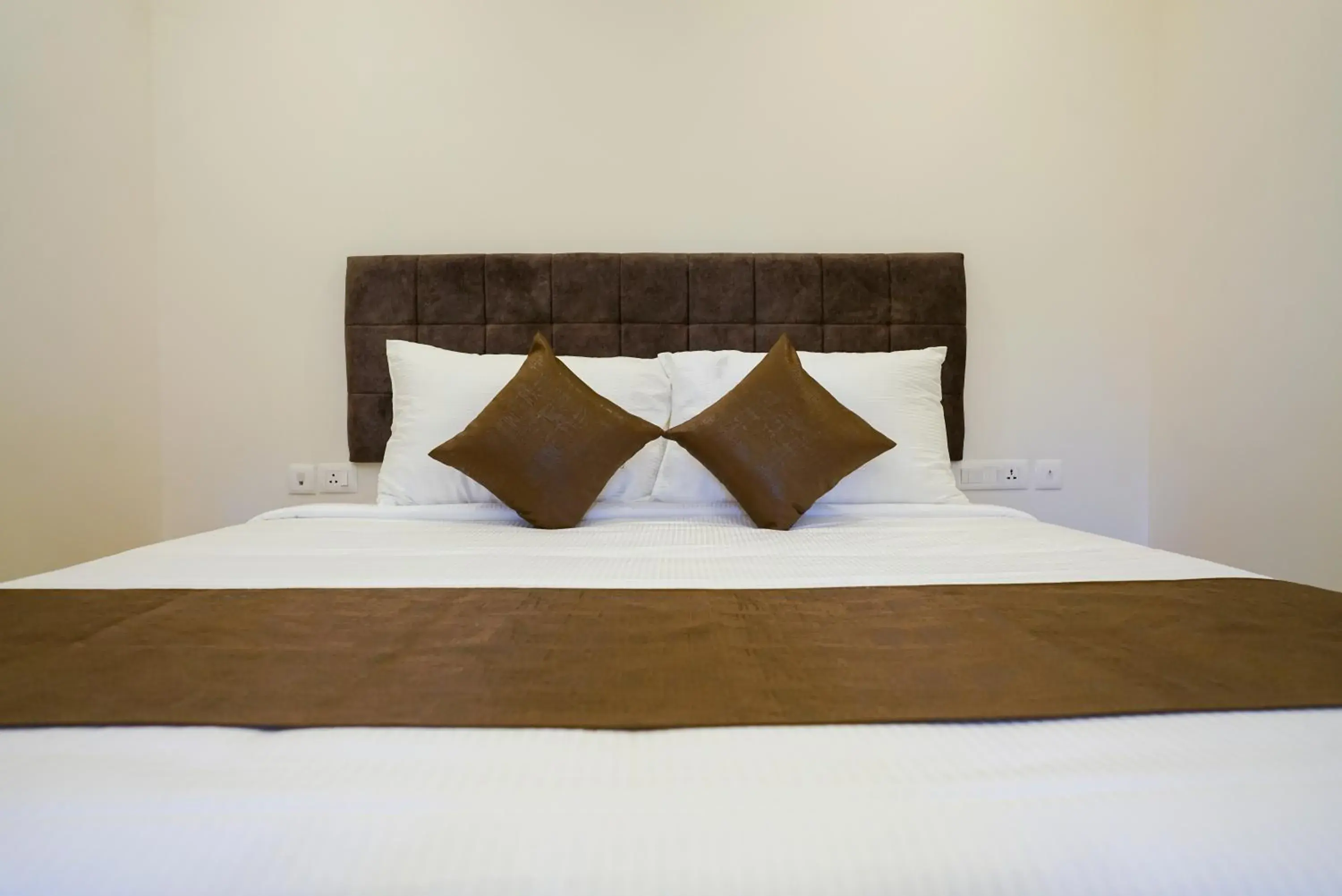 Bed in Grand Plaza Inn Bed in Grand Plaza Inn