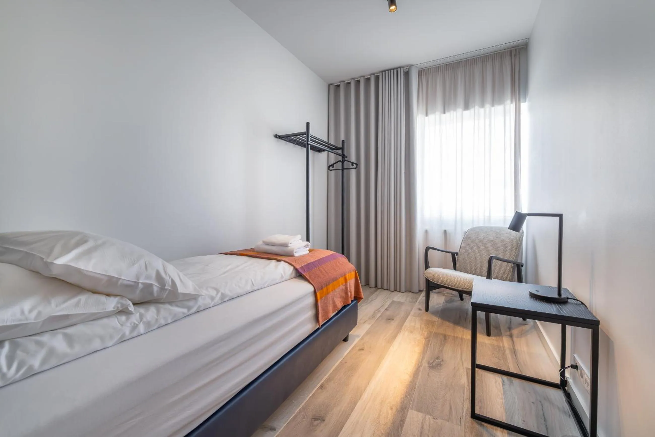 Bed in Hlemmur Suites