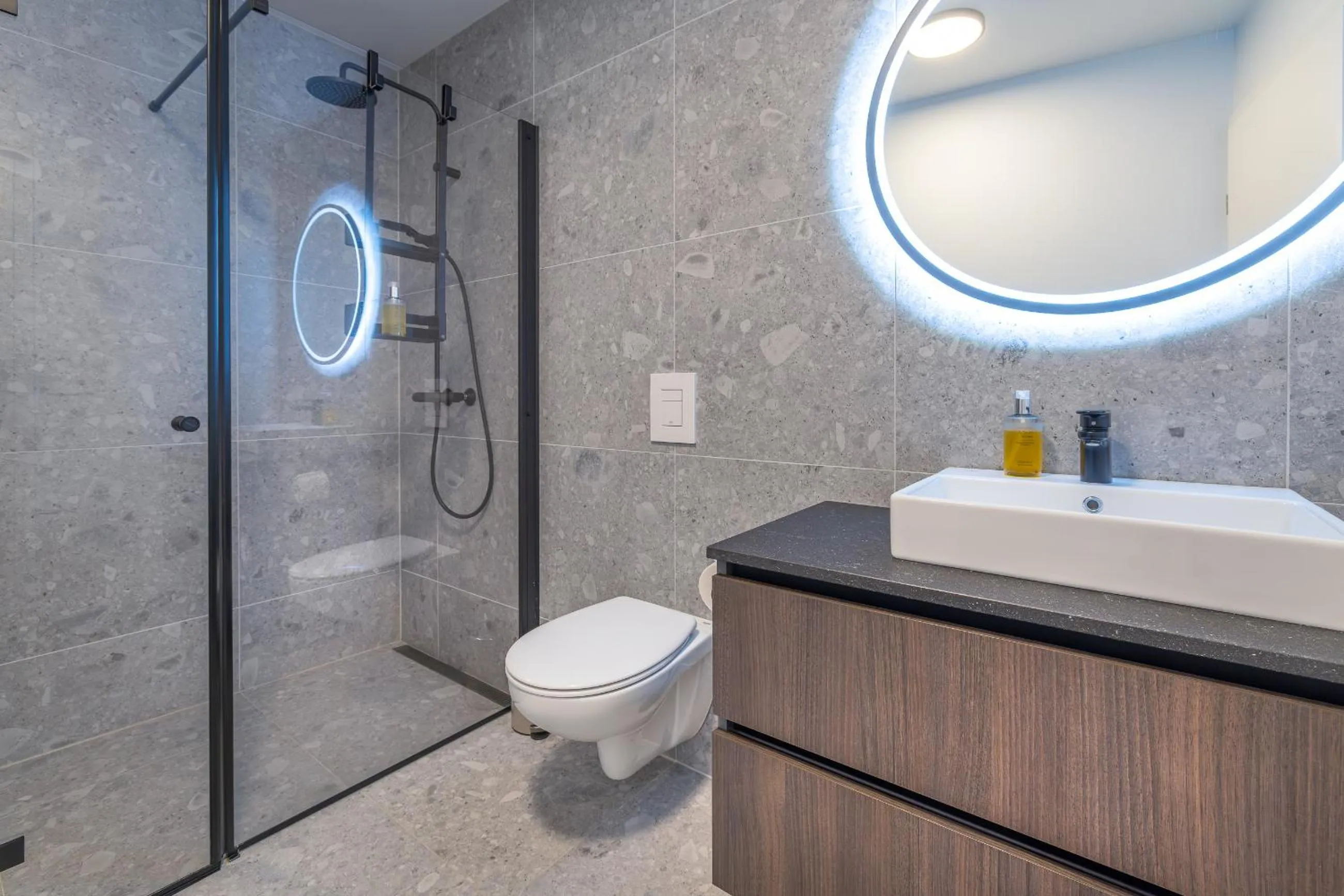 Shower in Hlemmur Suites