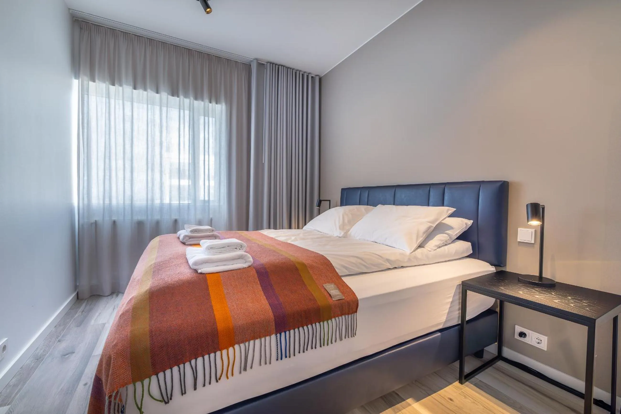 Bed in Hlemmur Suites