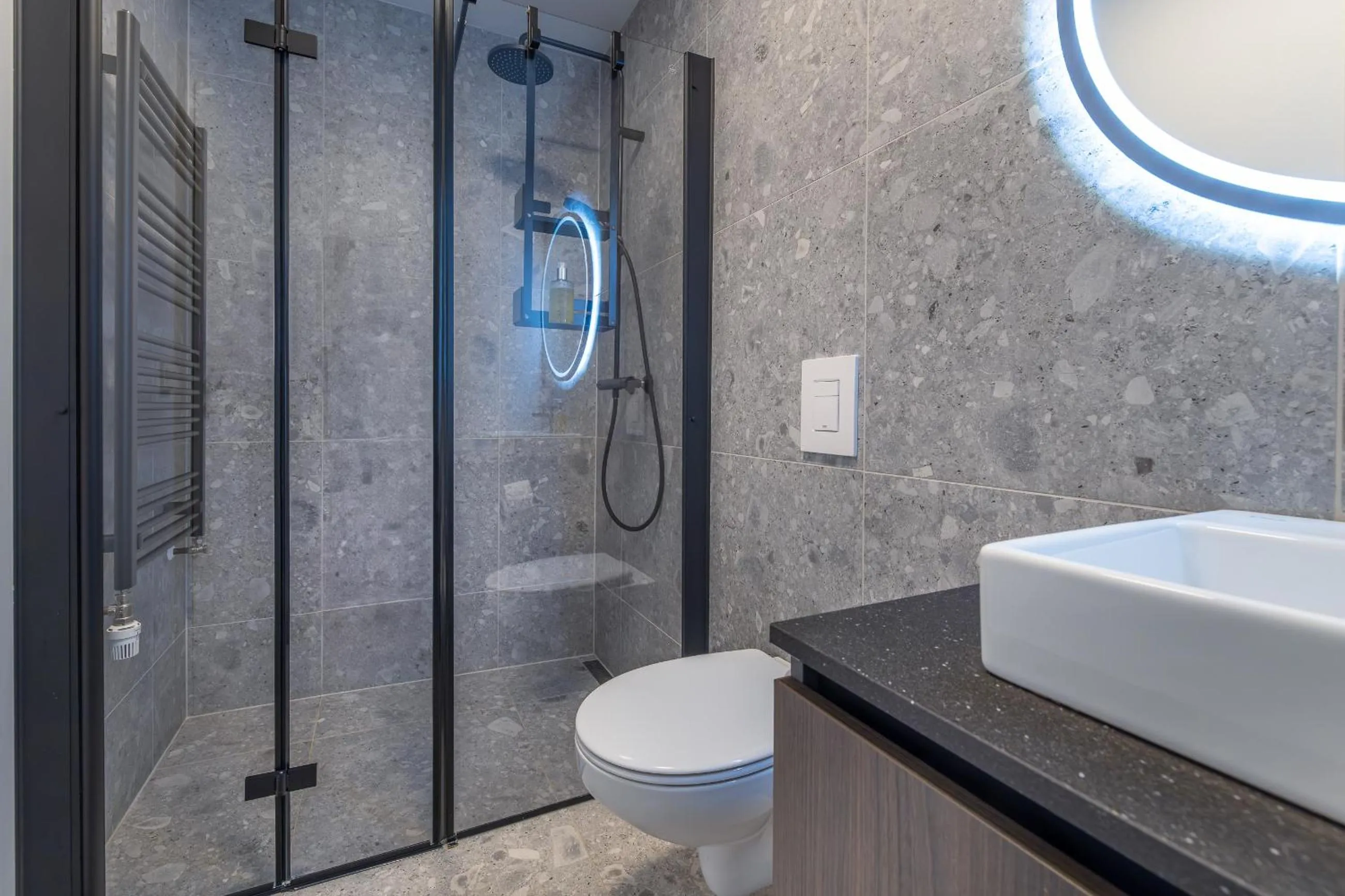 Shower in Hlemmur Suites