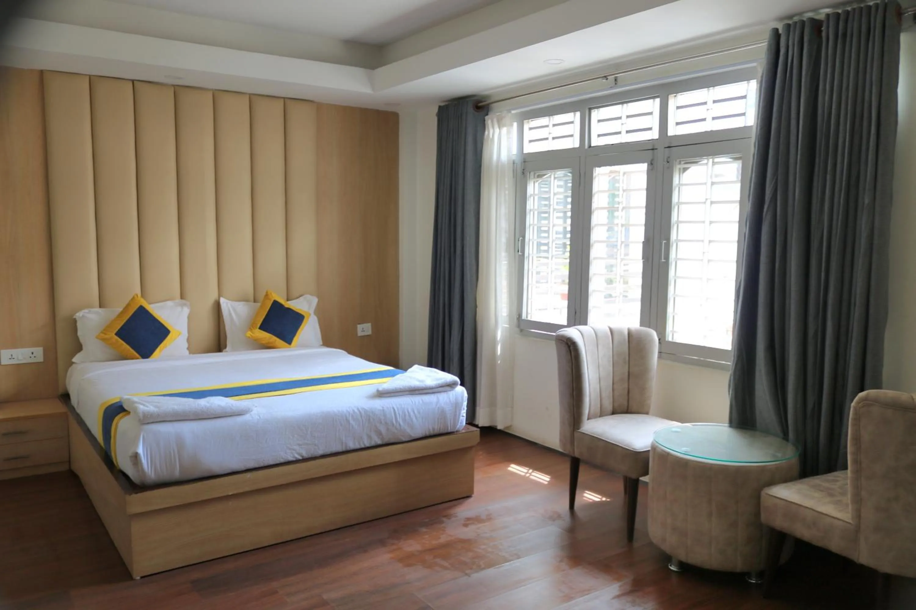 Bedroom in Hotel Mustang Holiday Inn