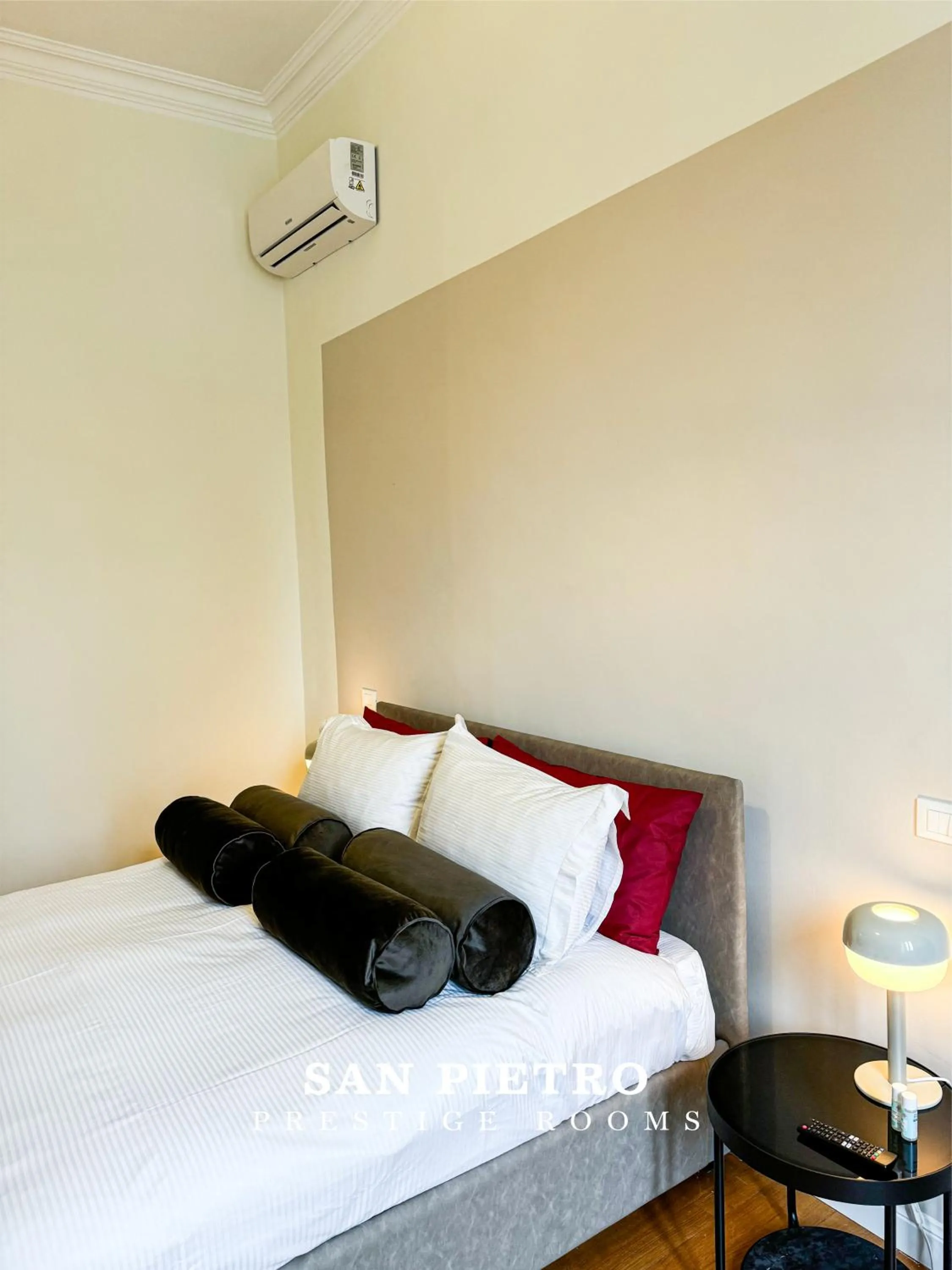 Bed in San Pietro Prestige Rooms