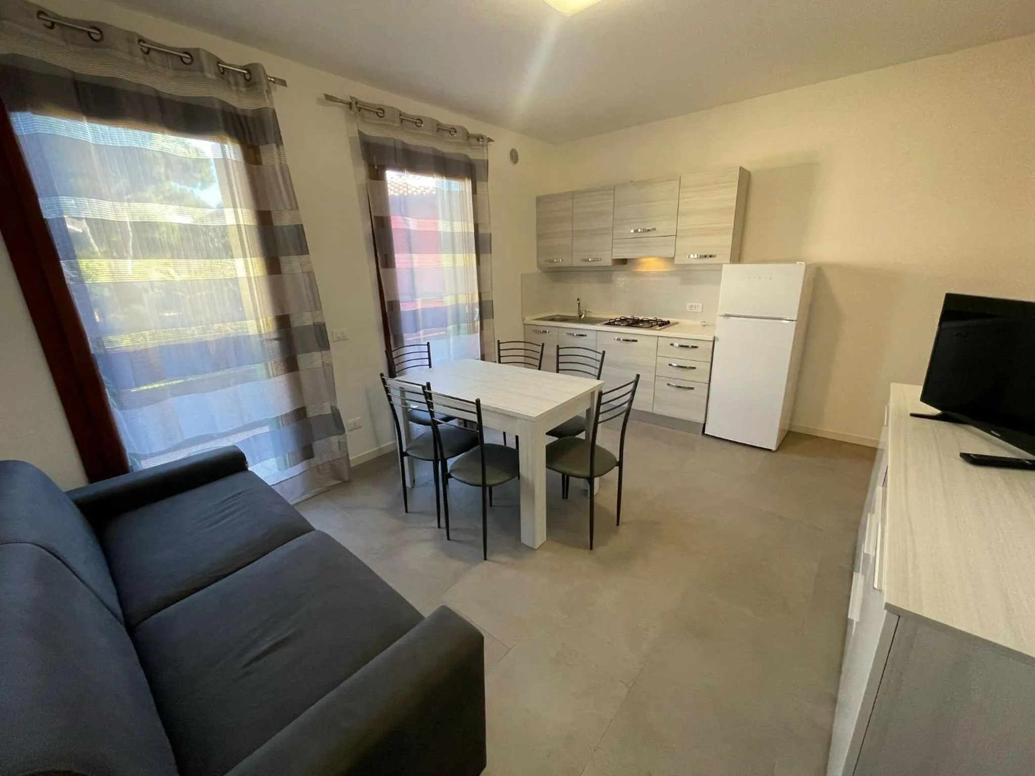 Kitchen or kitchenette in Residence Le Piramidi - Agenzia Cocal