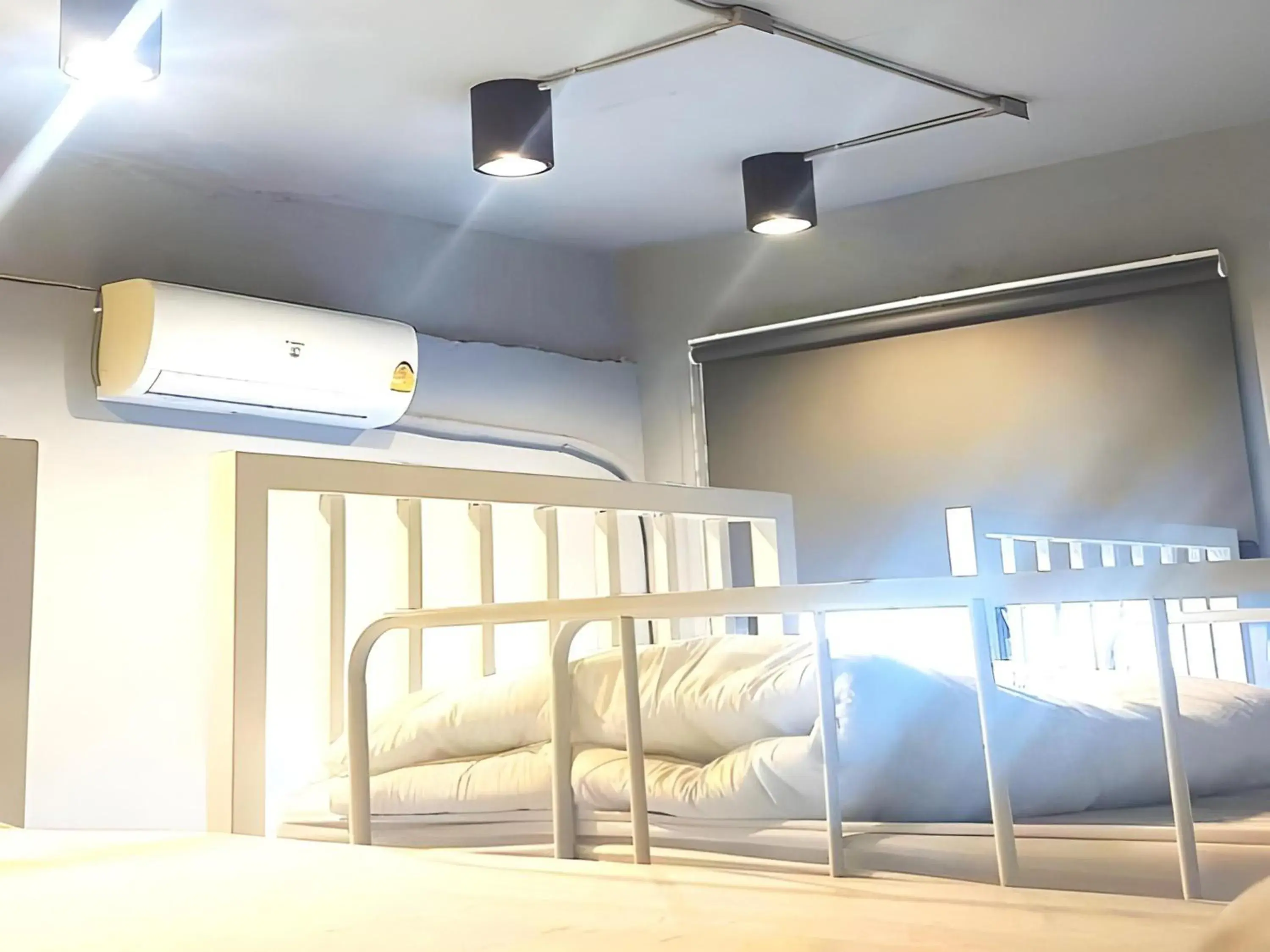 Bed in OYO 75465 Lucky Hostel - Huai Khwang Bed in OYO 75465 Lucky Hostel - Huai Khwang