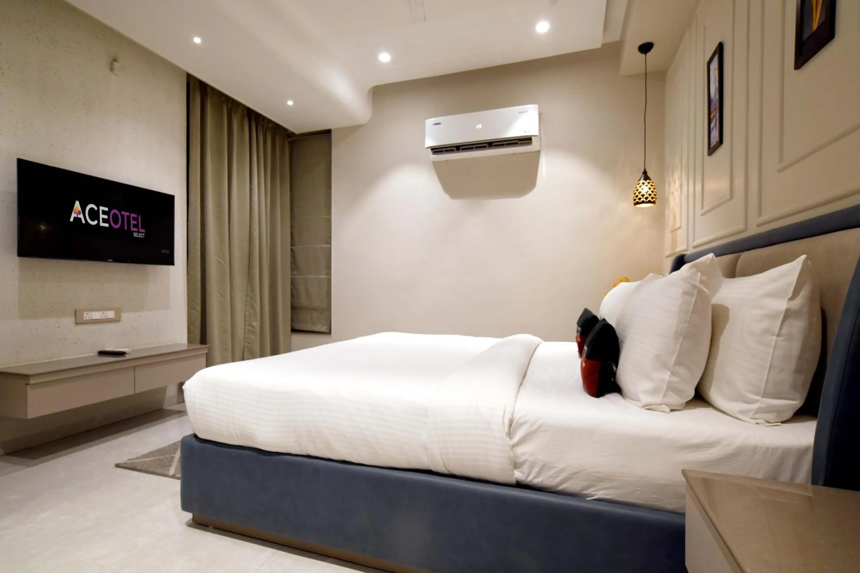 Communal lounge/ TV room, Bed in Aceotel Select Tulsi Vijay Nagar- A Luxury Boutique Hotel