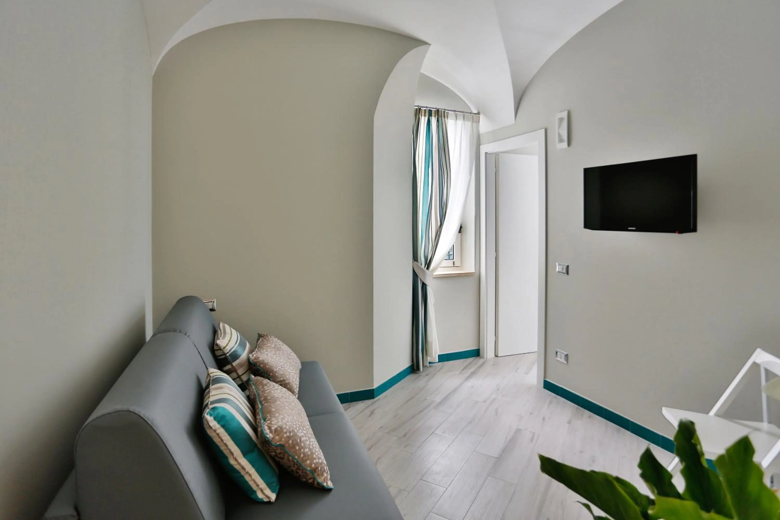 Living room in Amalfi Apartments Design centro storico