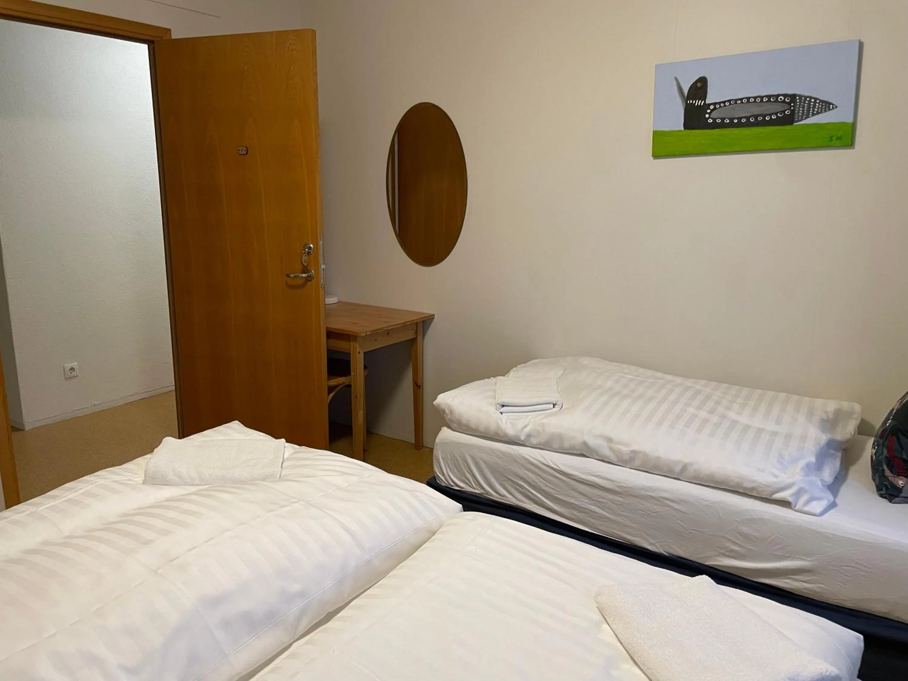 Bed in Solheimar Eco-Village Guesthouse