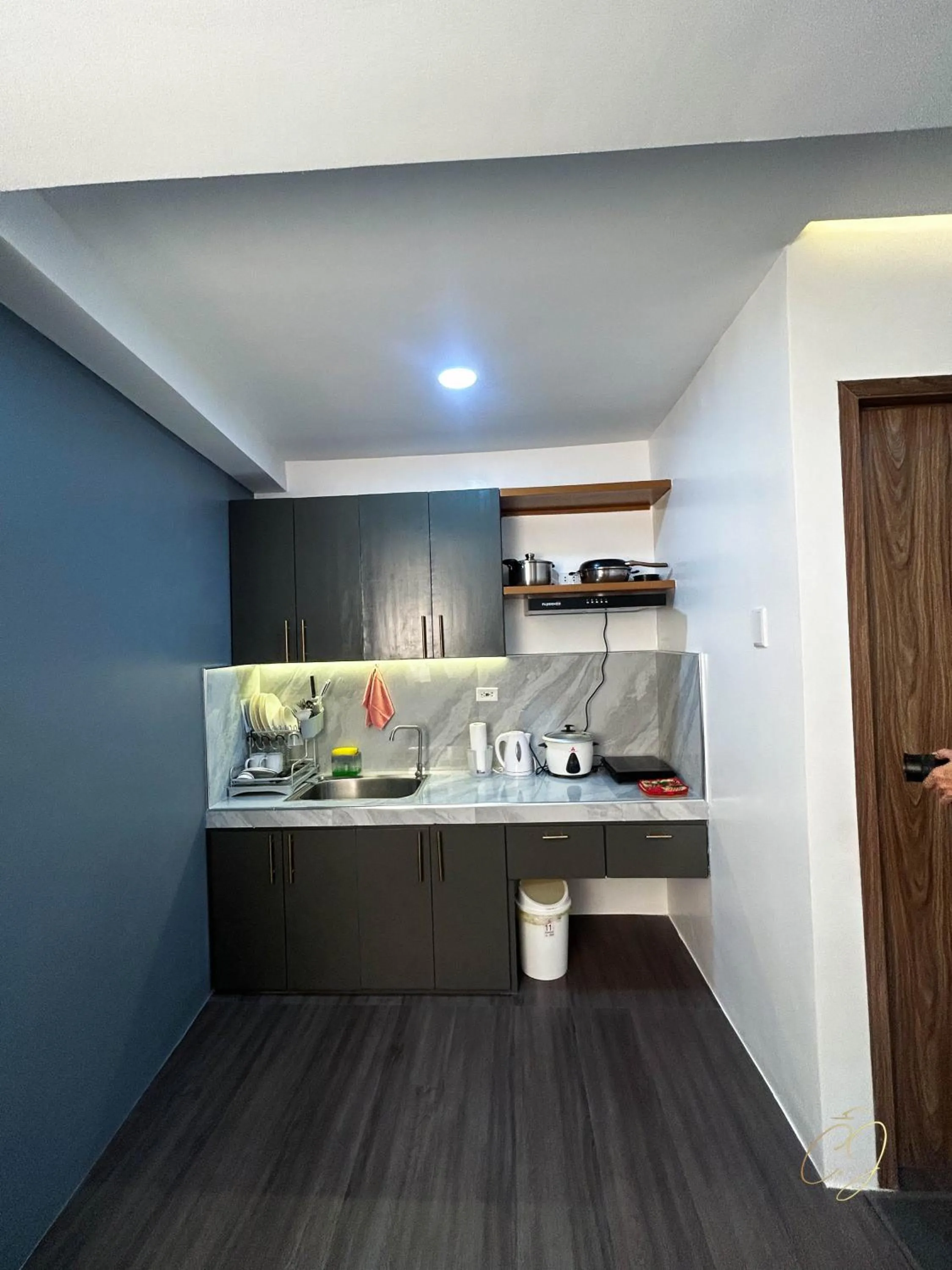 Kitchen or kitchenette in CJ Apartments
