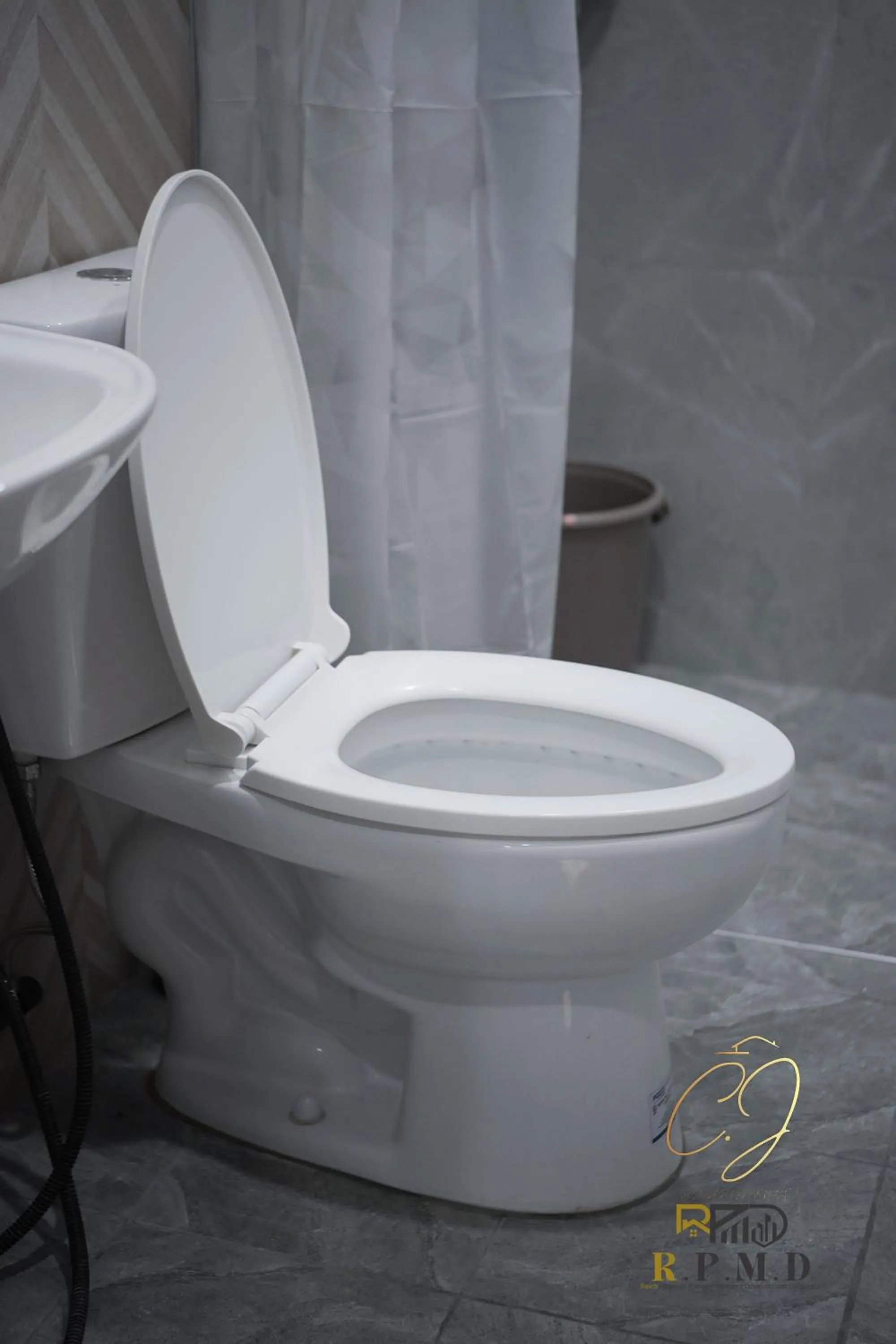 Toilet in CJ Apartments