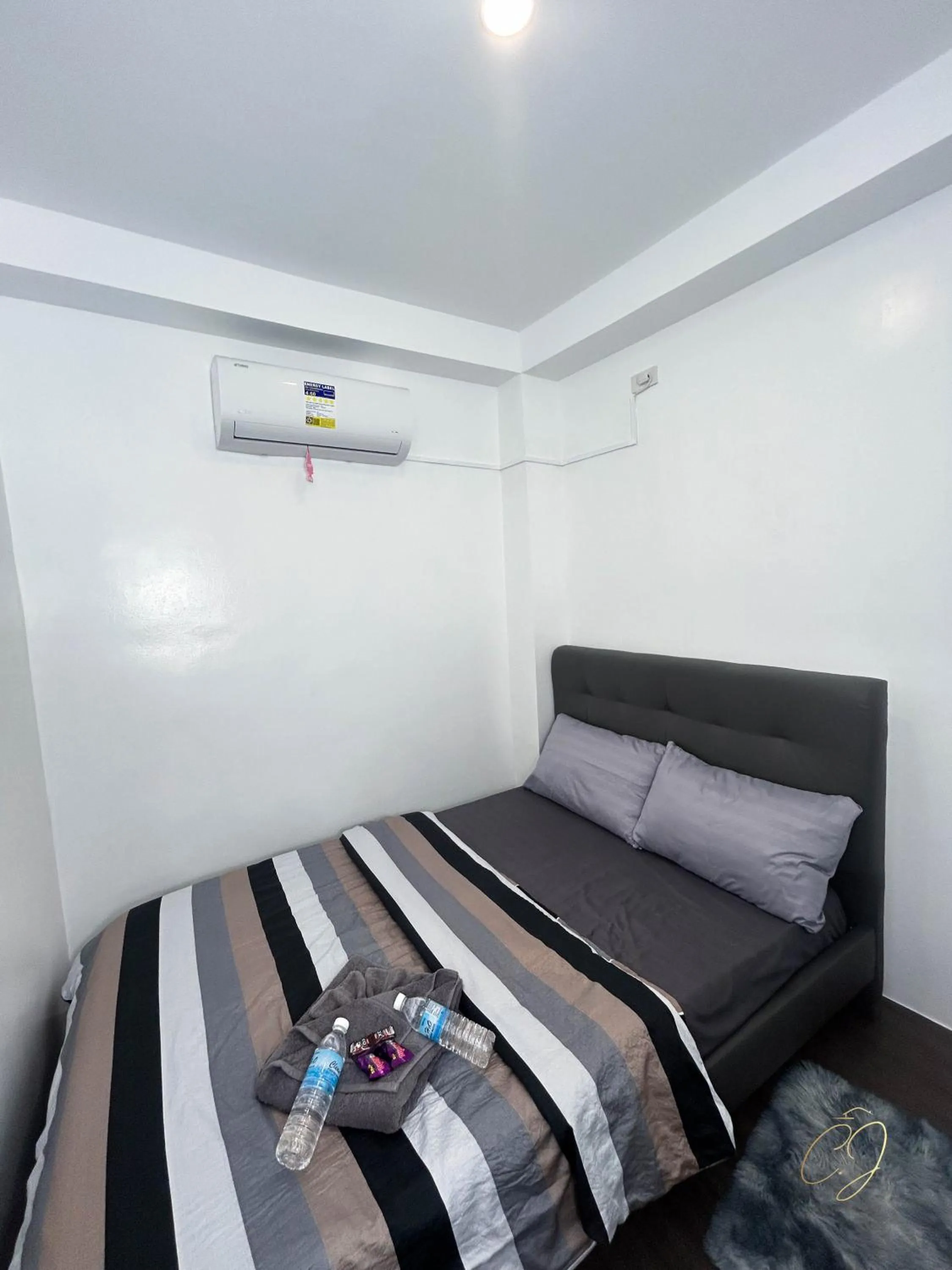 Bed in CJ Apartments