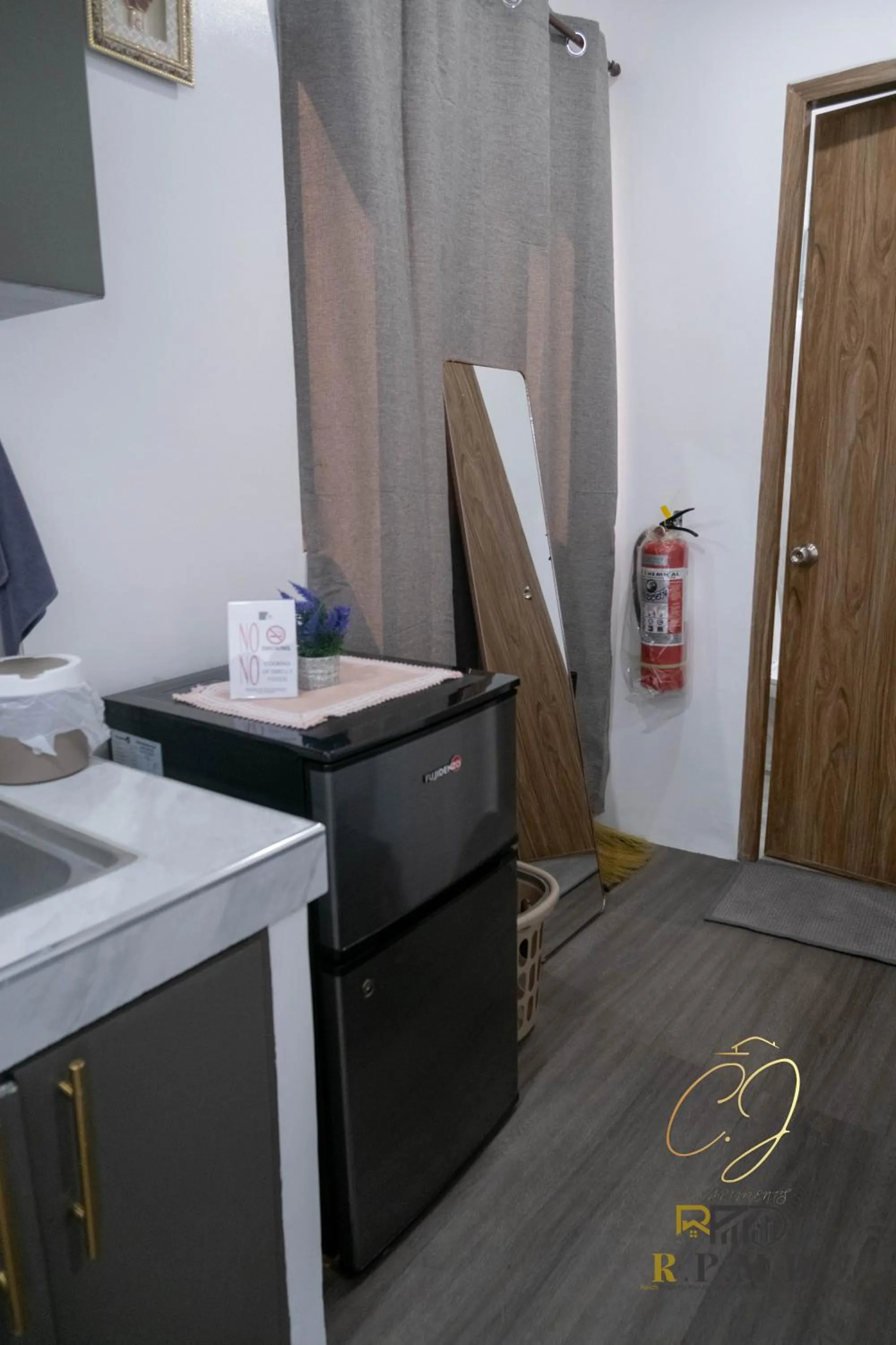 Kitchen or kitchenette in CJ Apartments