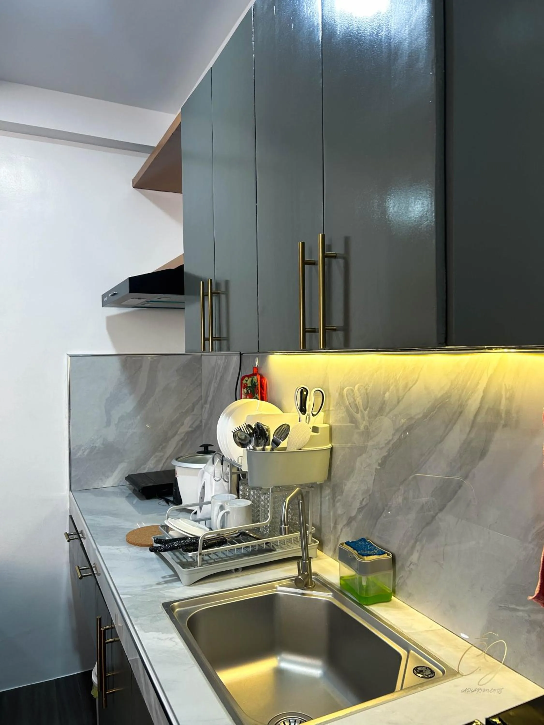 Kitchen or kitchenette in CJ Apartments