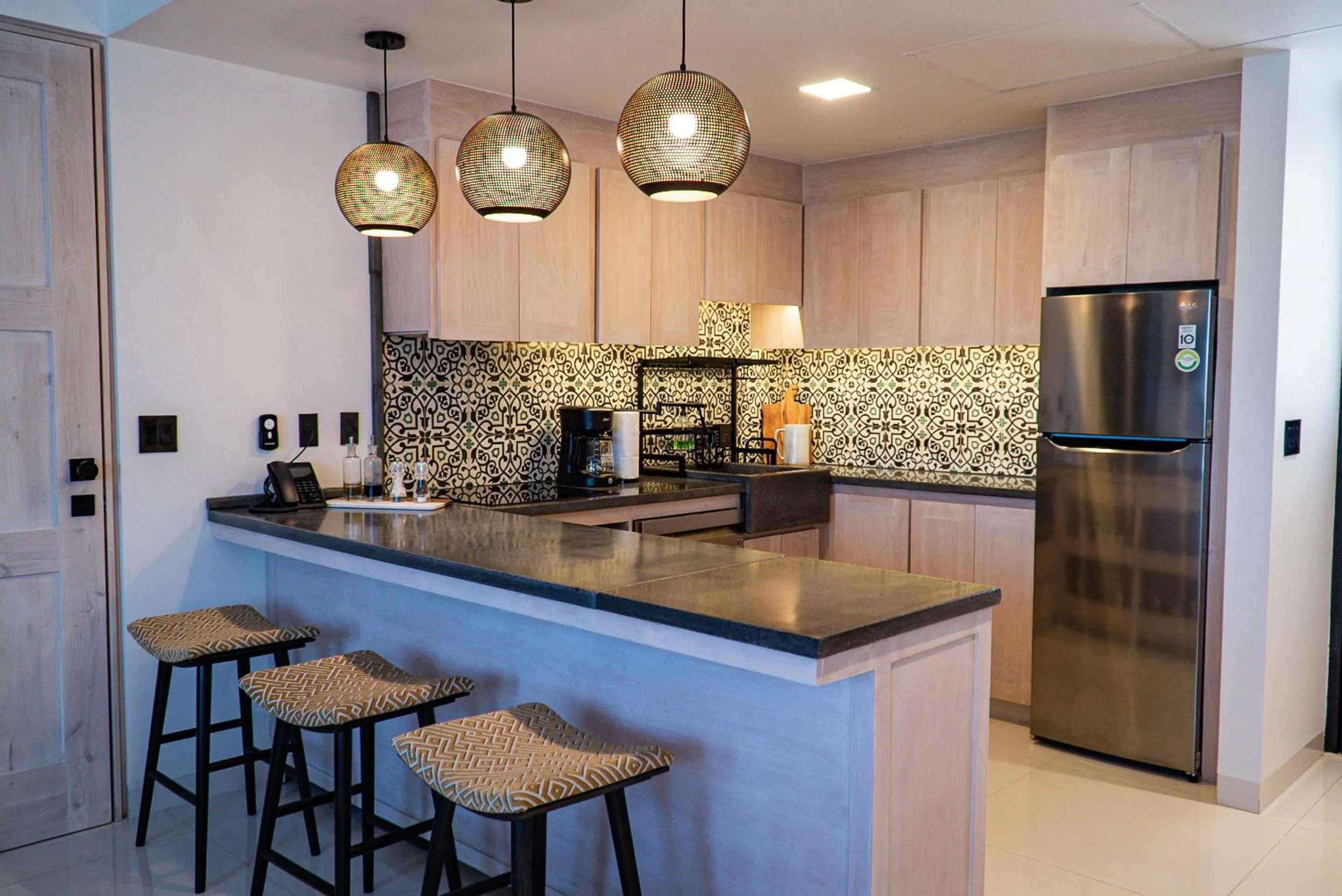 Kitchen or kitchenette in Flamboyan Hotel & Residences