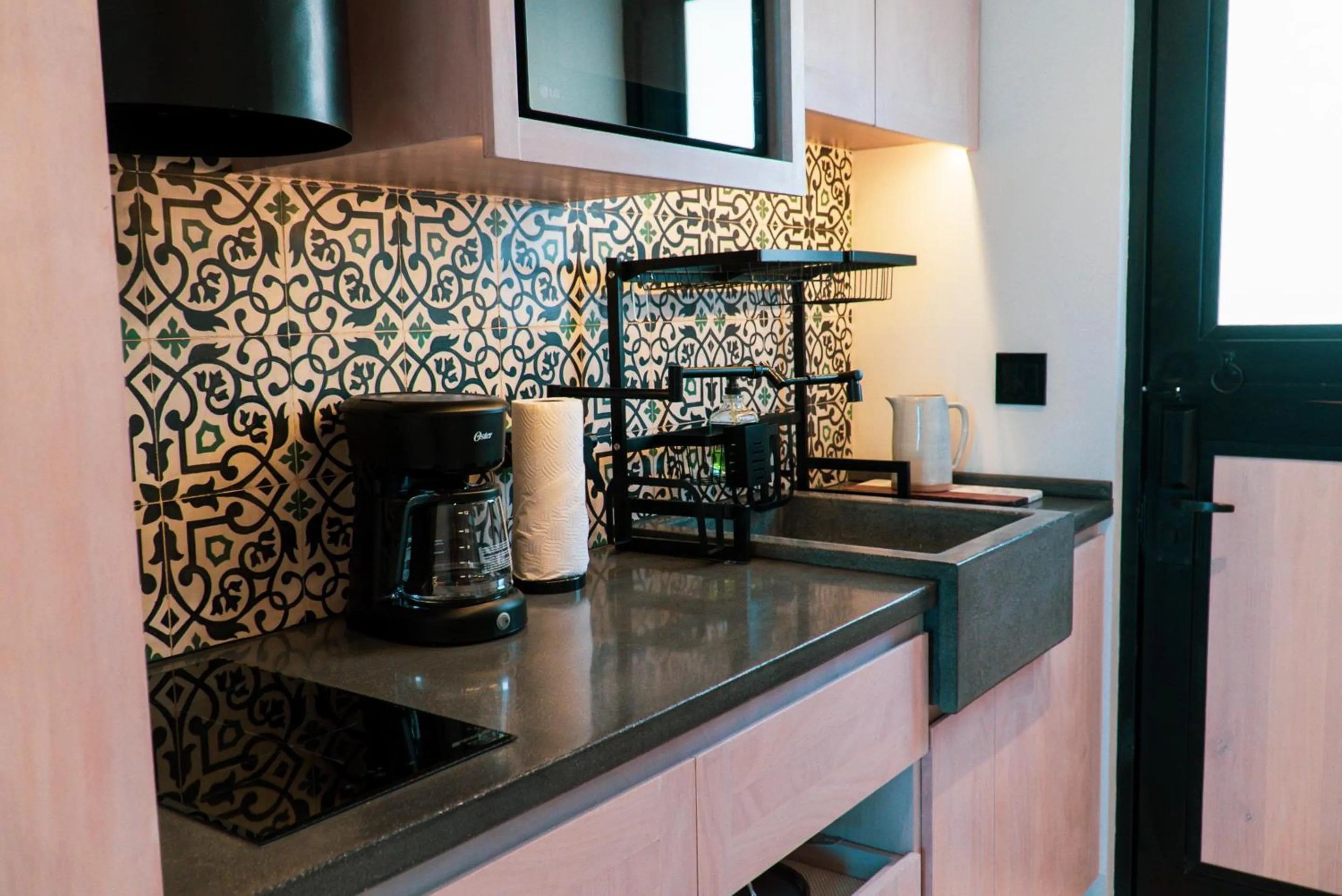 Kitchen or kitchenette in Flamboyan Hotel & Residences