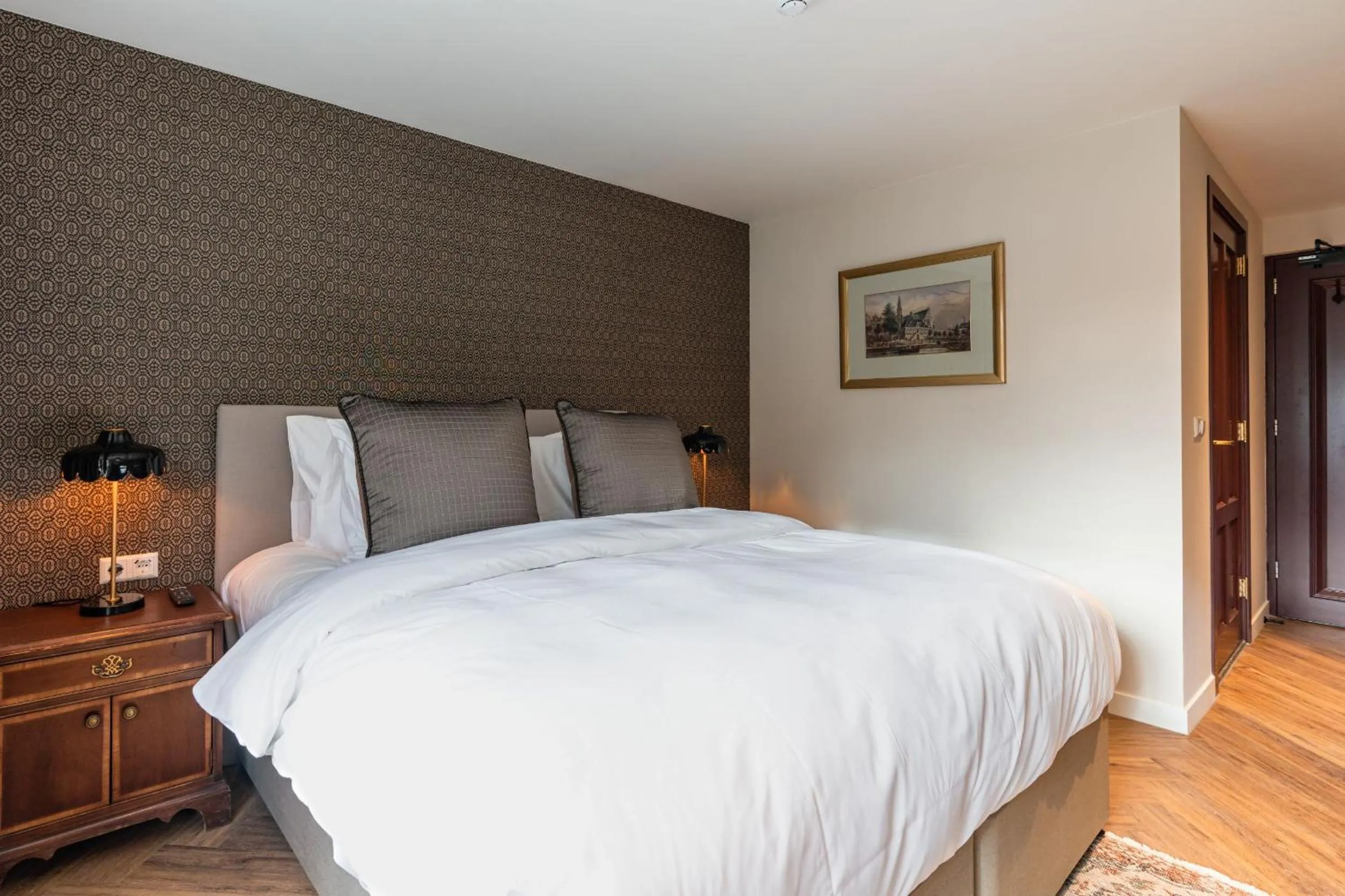 Bed in Boetiekhotel De Kastanjehof