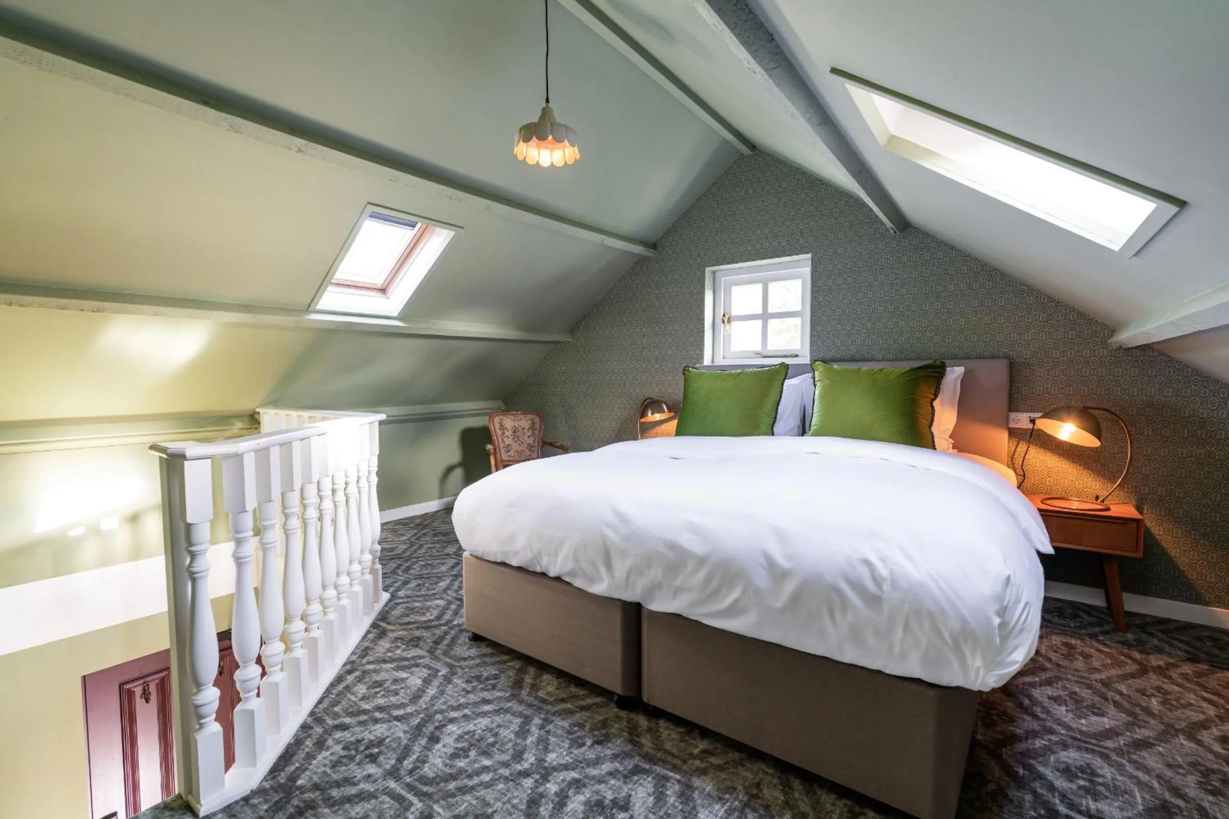 Bed in Boetiekhotel De Kastanjehof