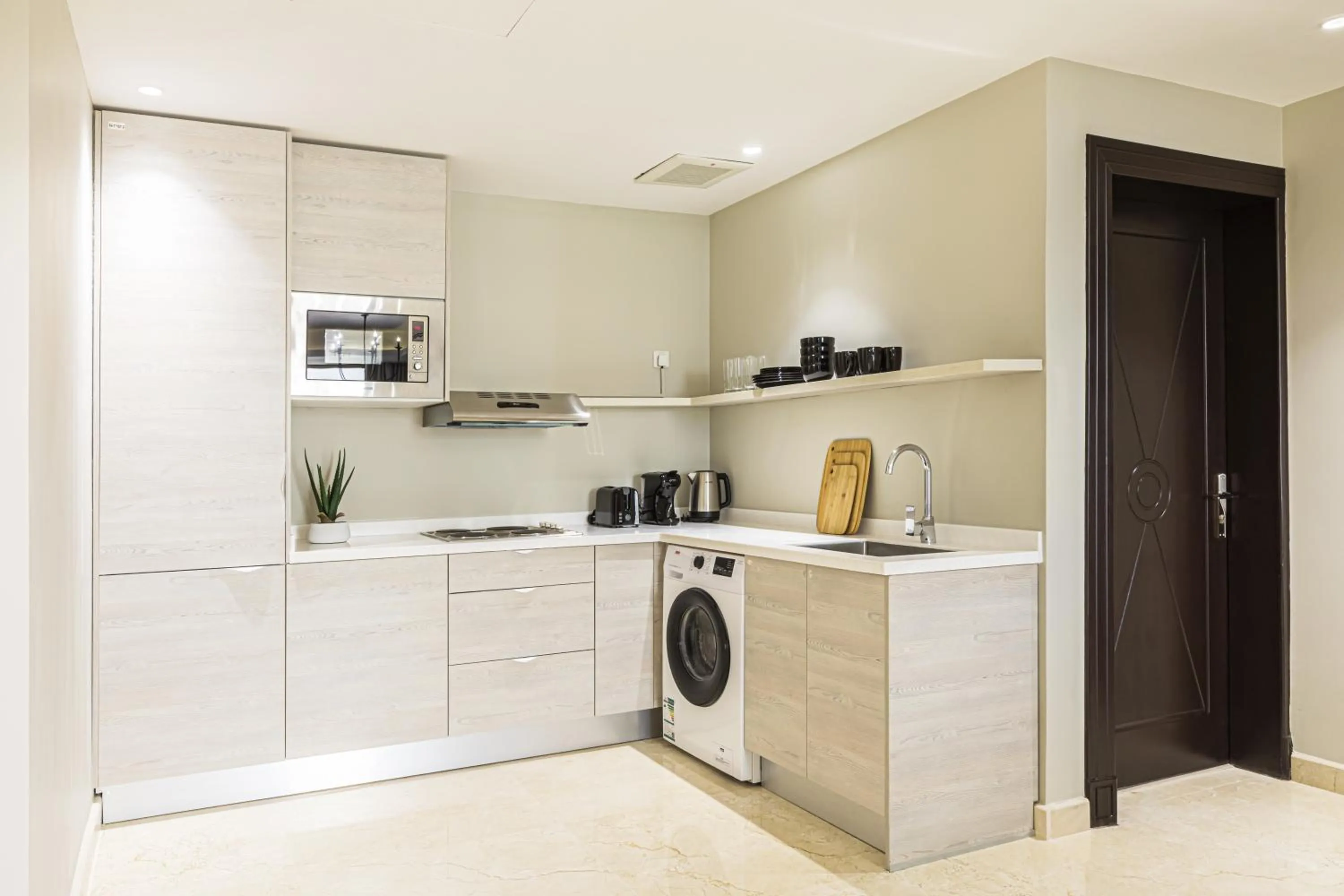 Kitchen or kitchenette in Stella Stays Olaya Tower 1