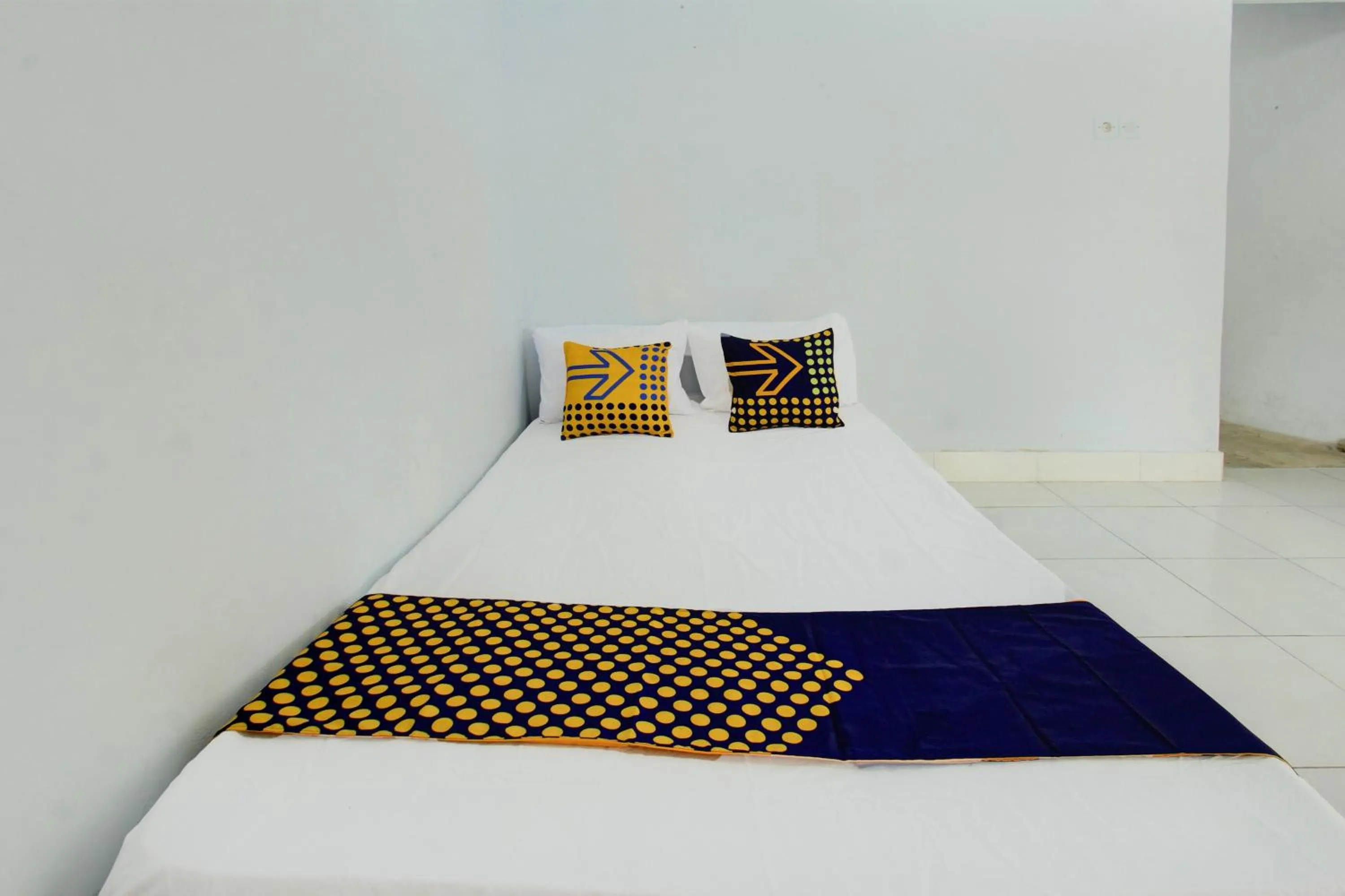 Bedroom in OYO Life 93015 Kos Anto