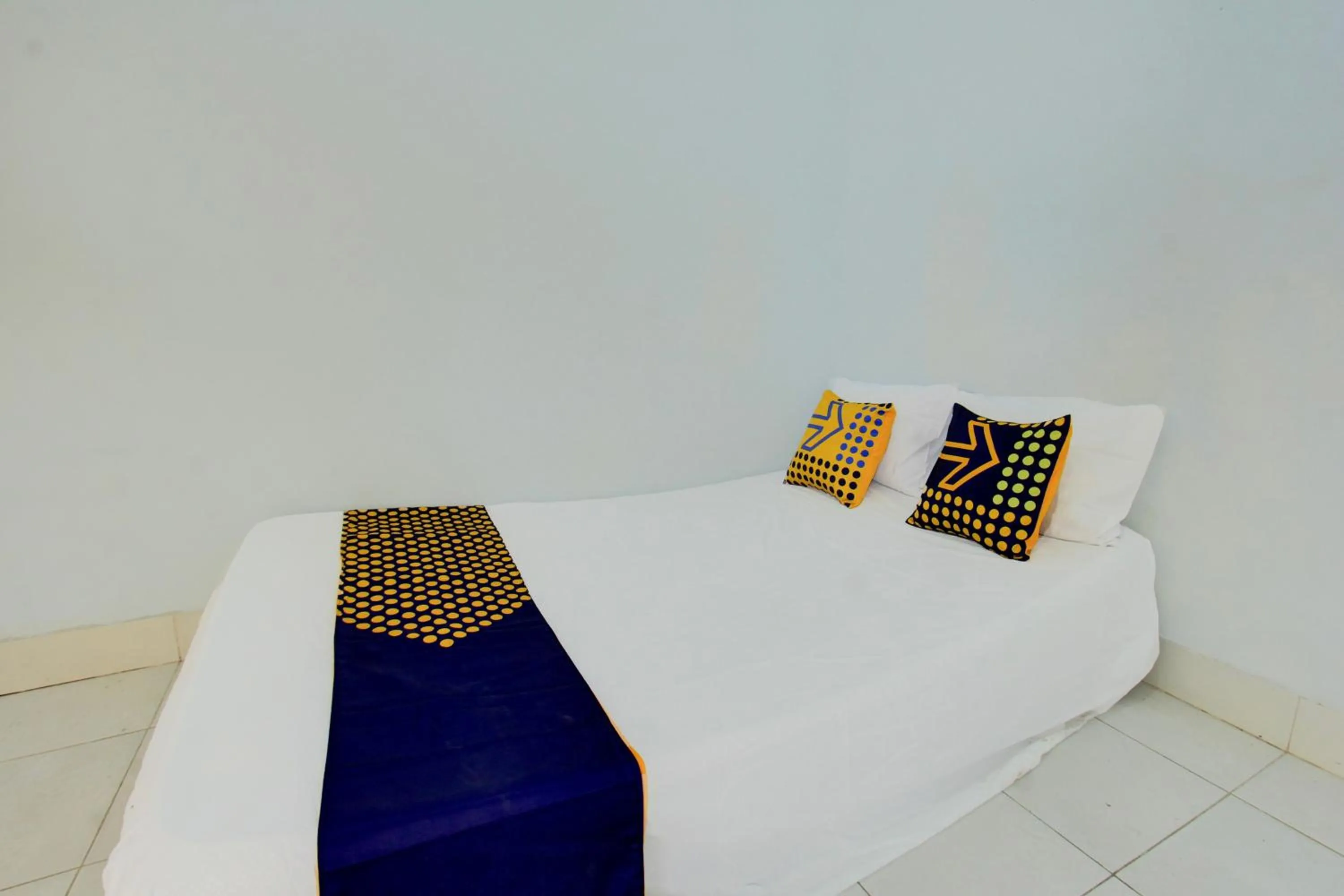 Bedroom in OYO Life 93015 Kos Anto