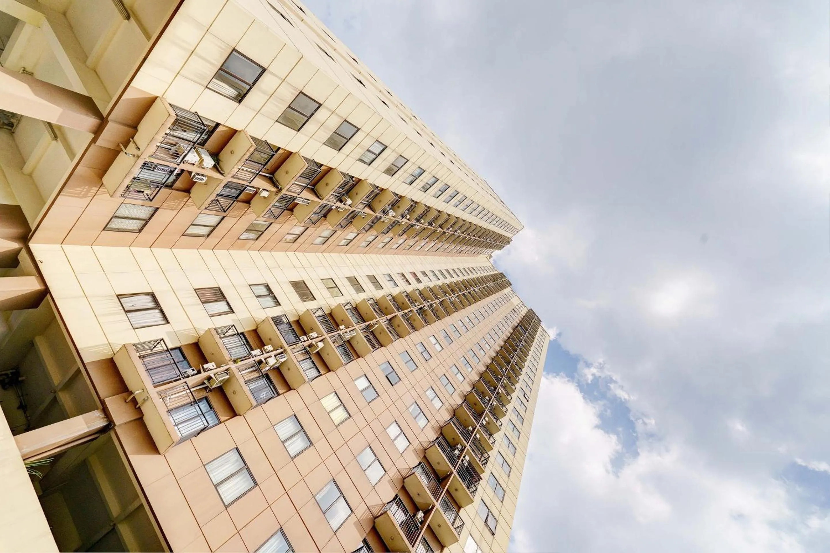 Facade/entrance in OYO Life 93310 Apartemen Tamansari Panoramic By Santuy 2