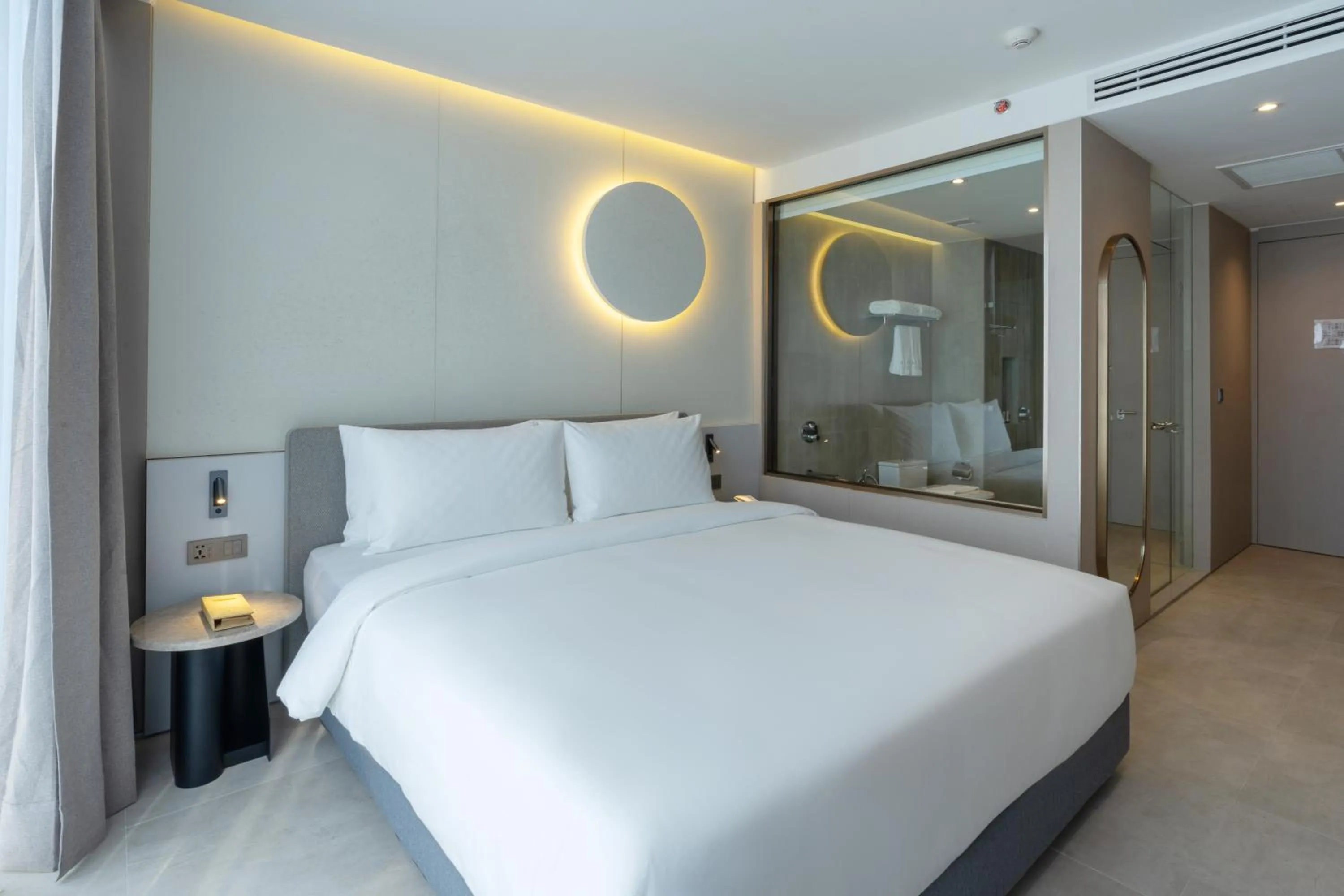 Bed in Akara Hotel Pattaya