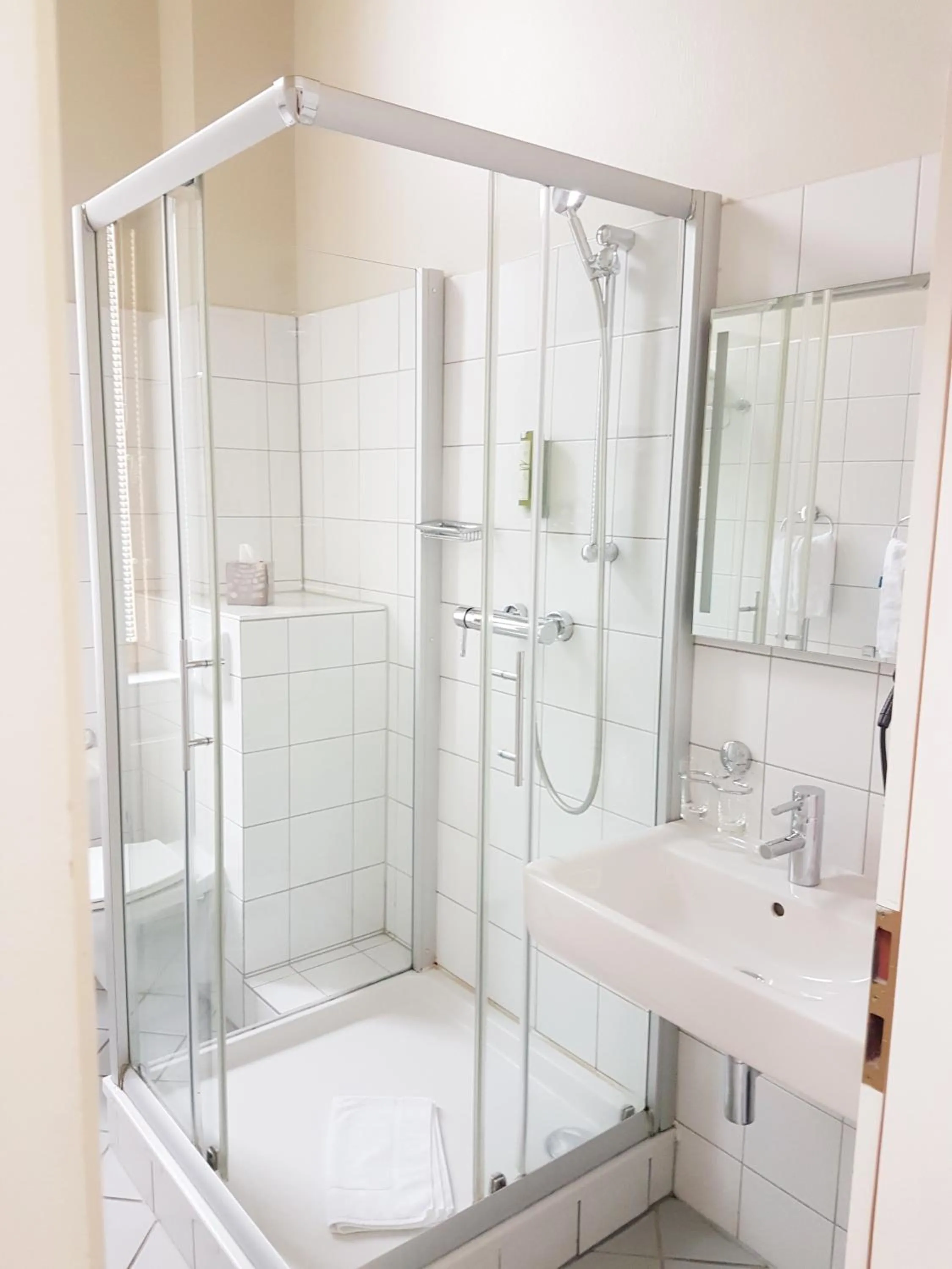Bathroom in Hotel Fährhaus GmbH
