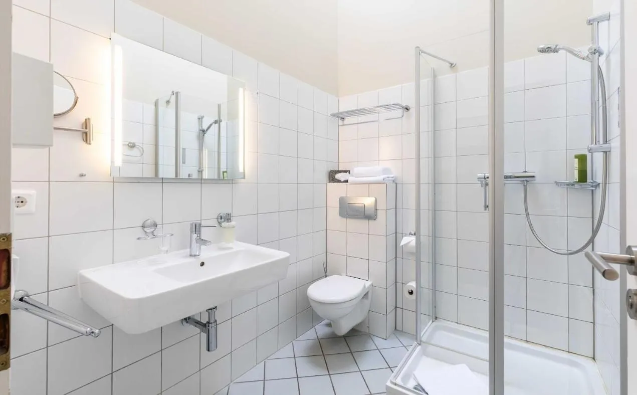 Bathroom in Hotel Fährhaus GmbH