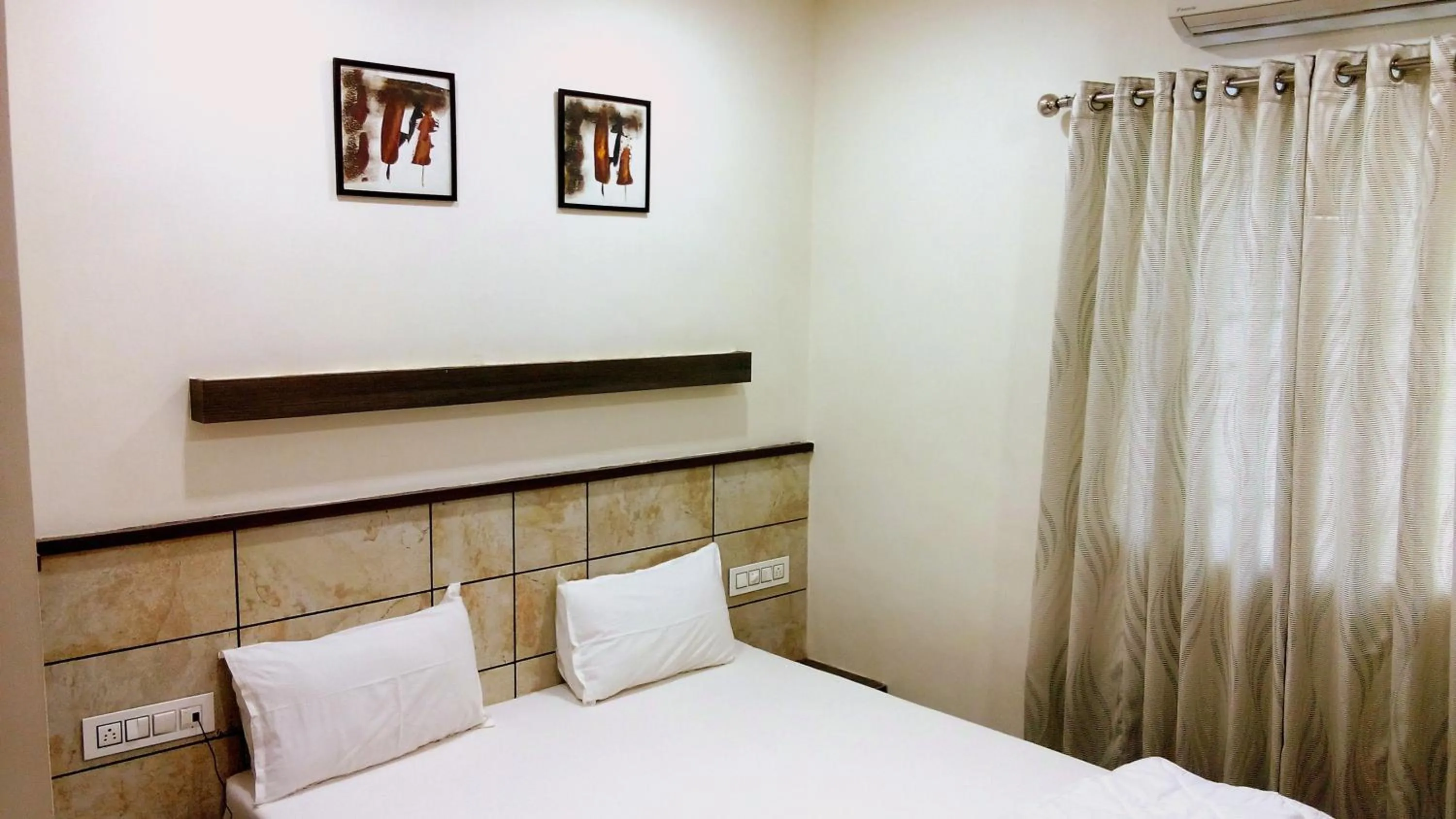 Decorative detail, Bed in Hotel City Inn