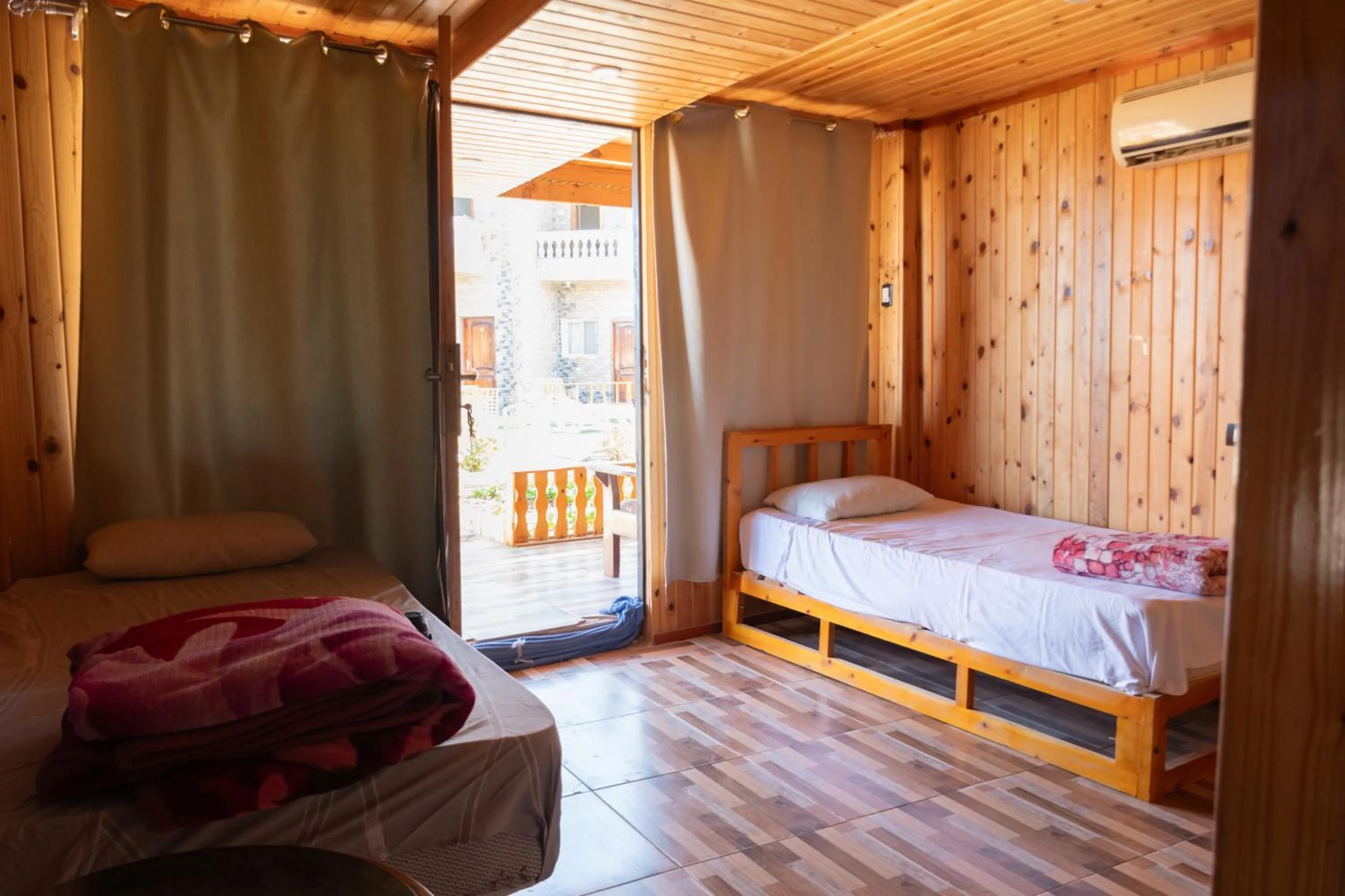 Bed in Green Beach Camp & Hotel