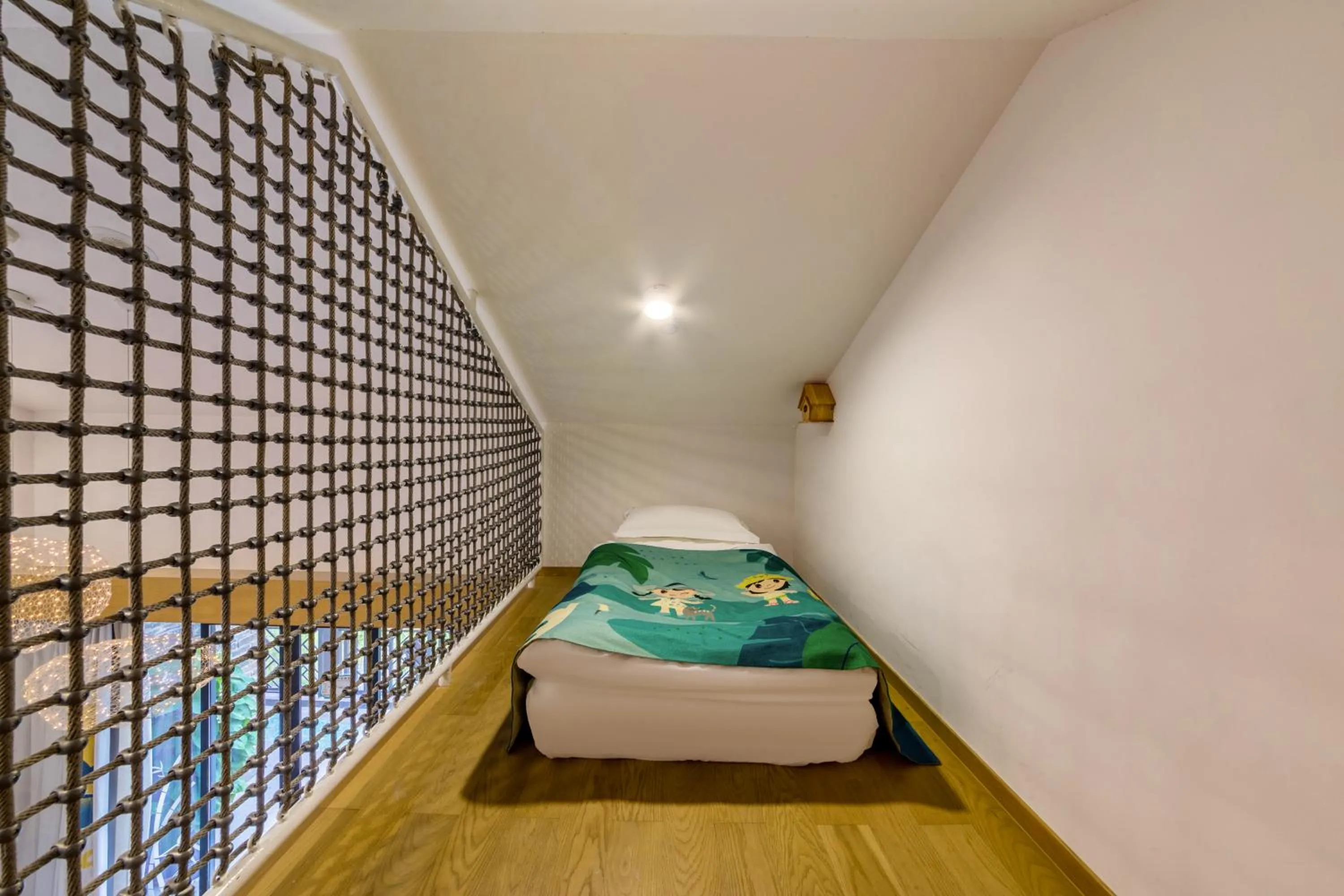 Bed in Little Hakka Hotel