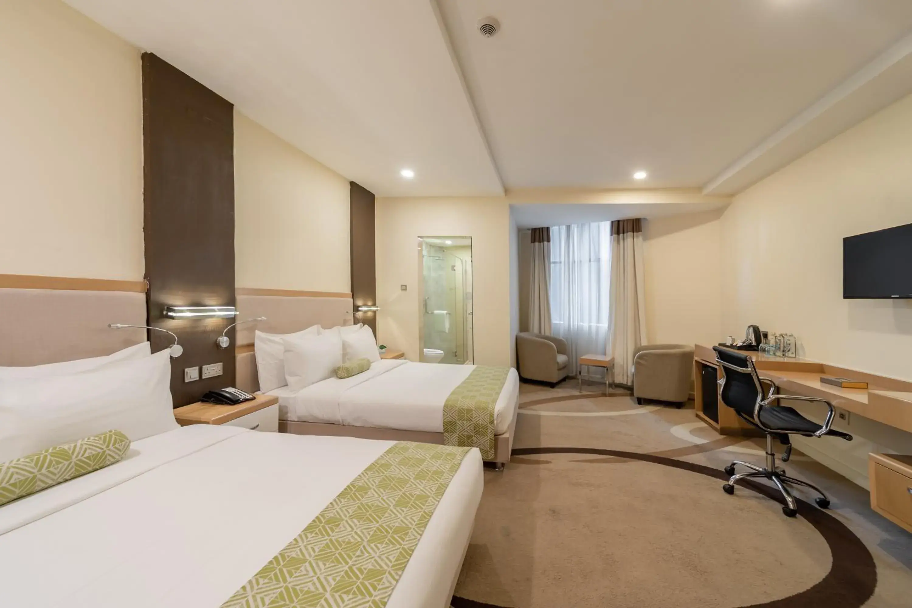 Communal lounge/ TV room, Bed in PrideInn Azure Hotel Nairobi Westlands Communal lounge/ TV room, Bed in PrideInn Azure Hotel Nairobi Westlands