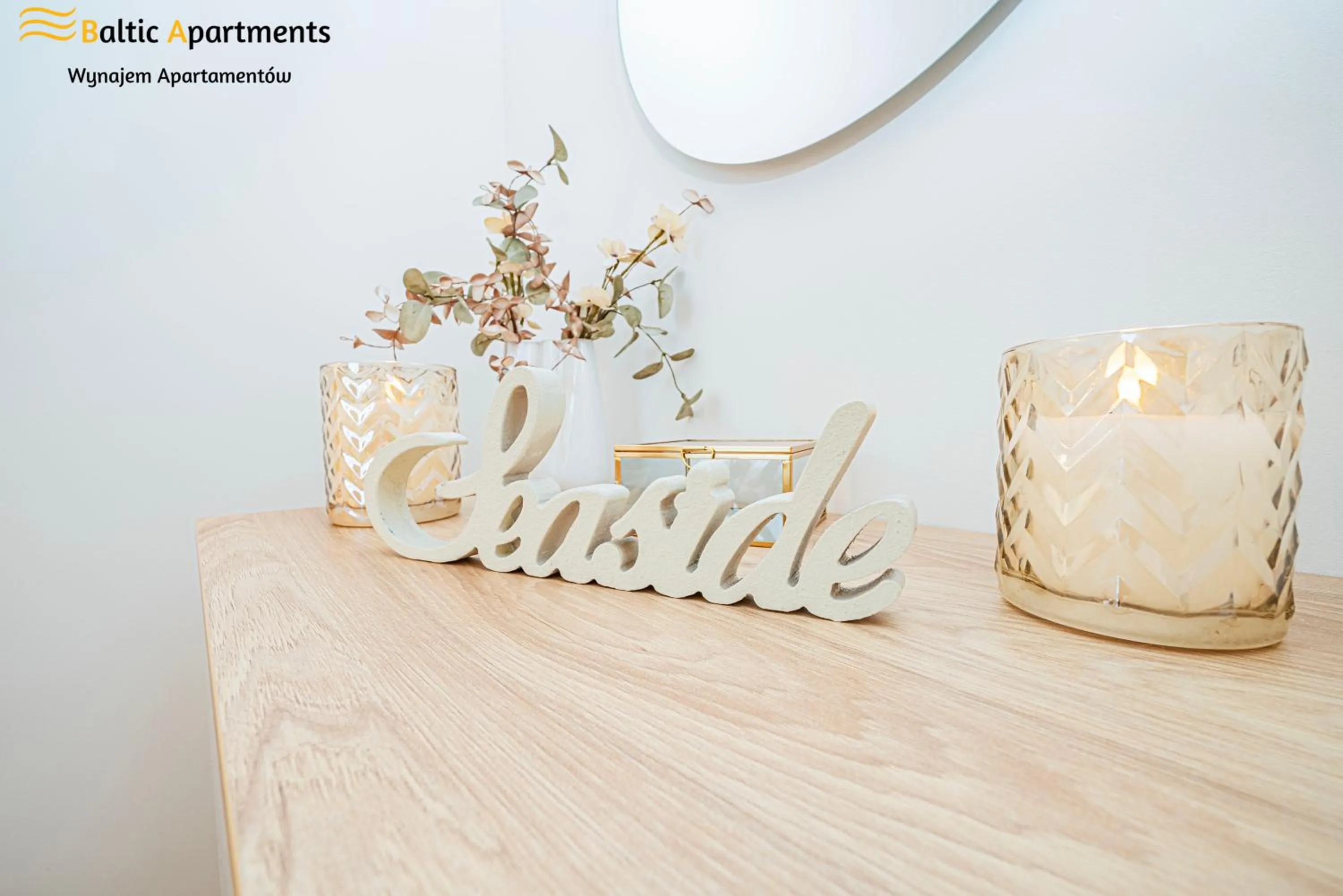 Property logo or sign in Seaside Garden Apartments & Wellness by Baltic Apartments