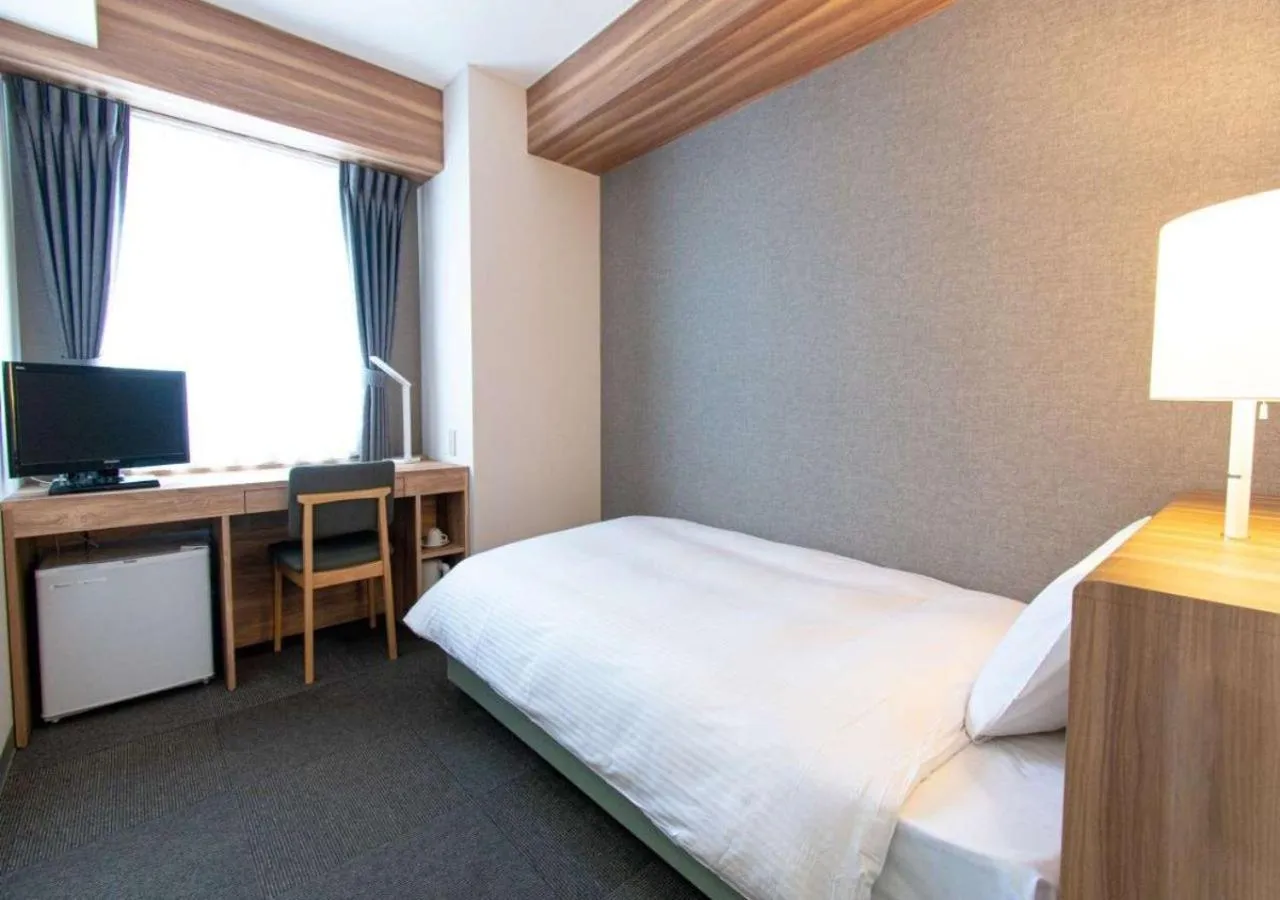 Photo of the whole room, Bed in Business Inn Norte