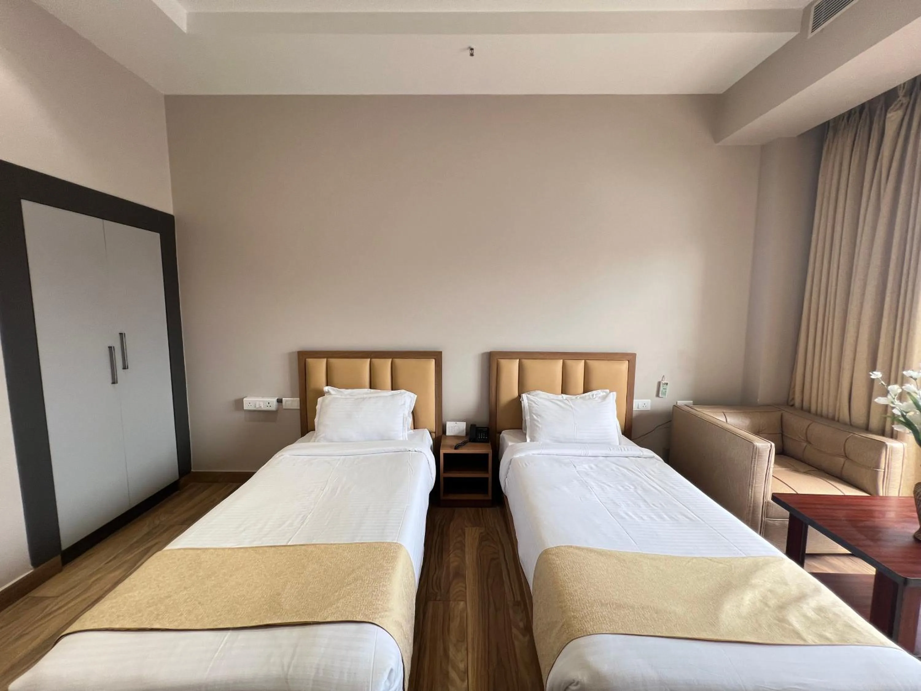 Bed in Finn's Weaver Resort, Kaziranga