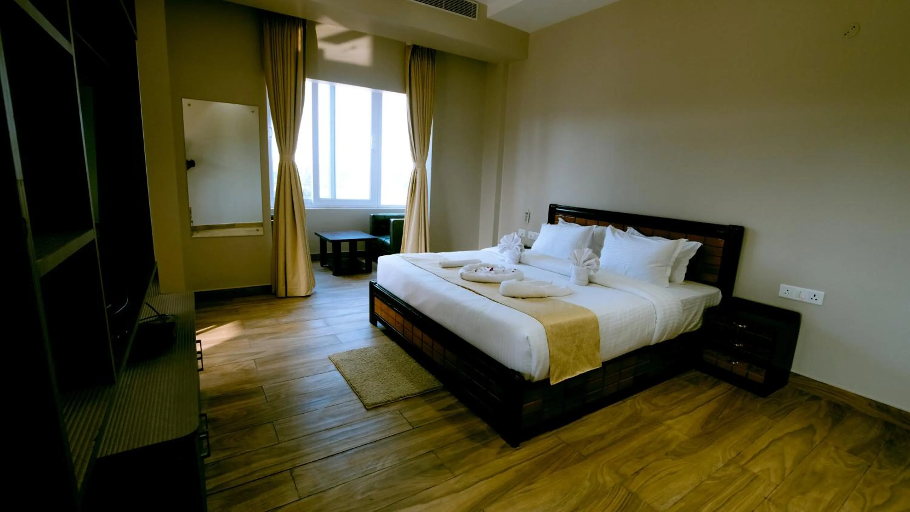 Bed in Finn's Weaver Resort, Kaziranga