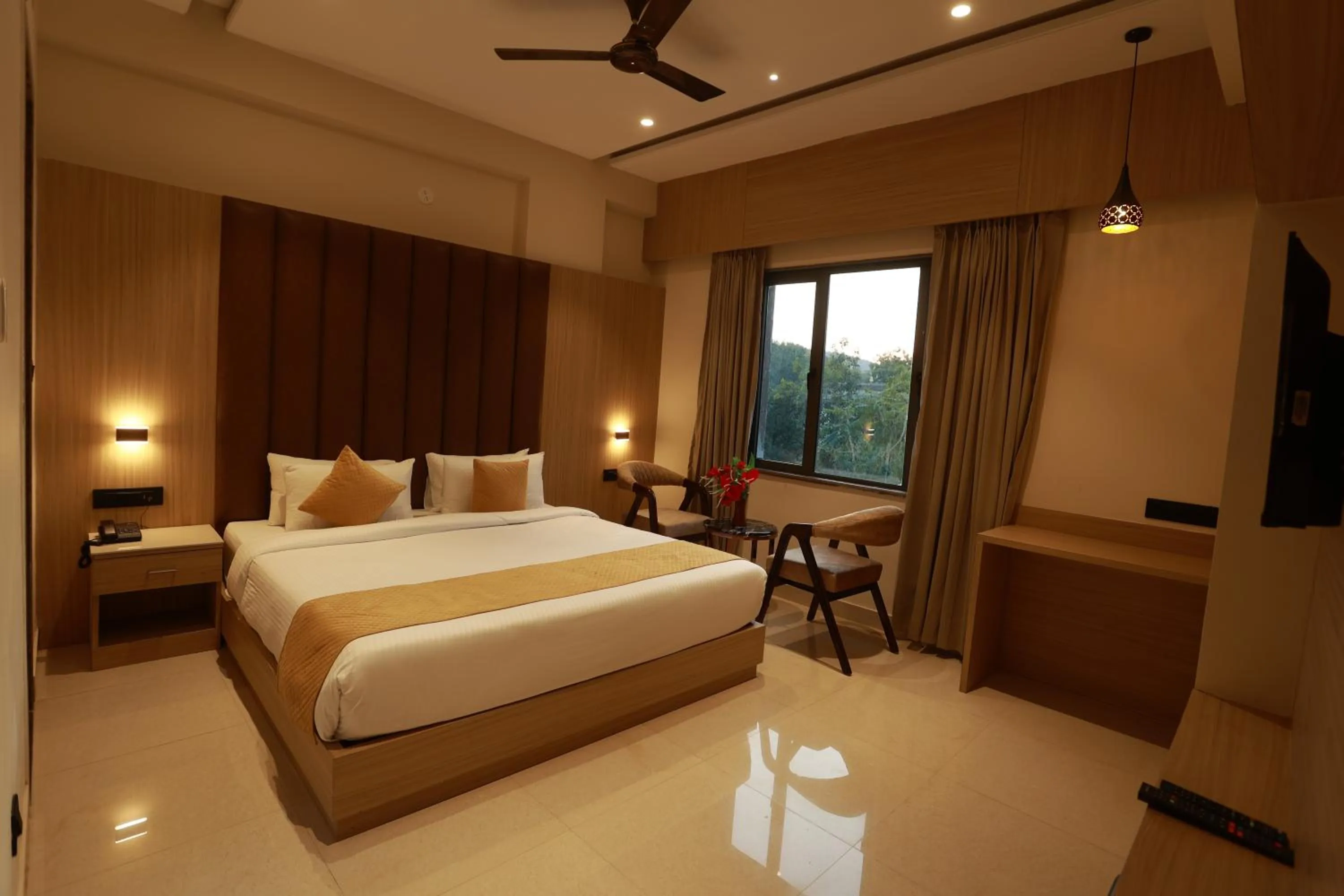 Bed in Hotel Taviral Regency