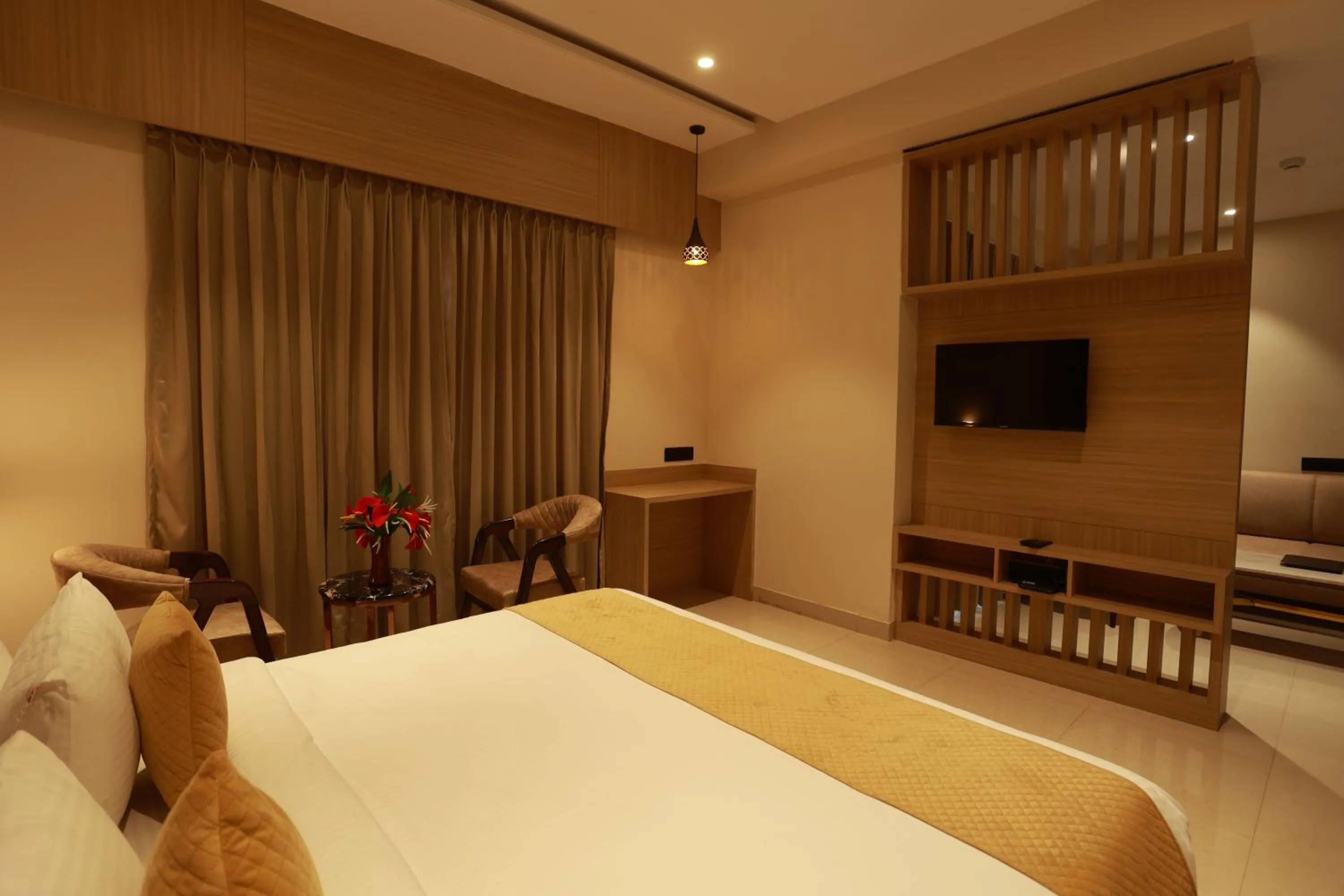 Bed in Hotel Taviral Regency